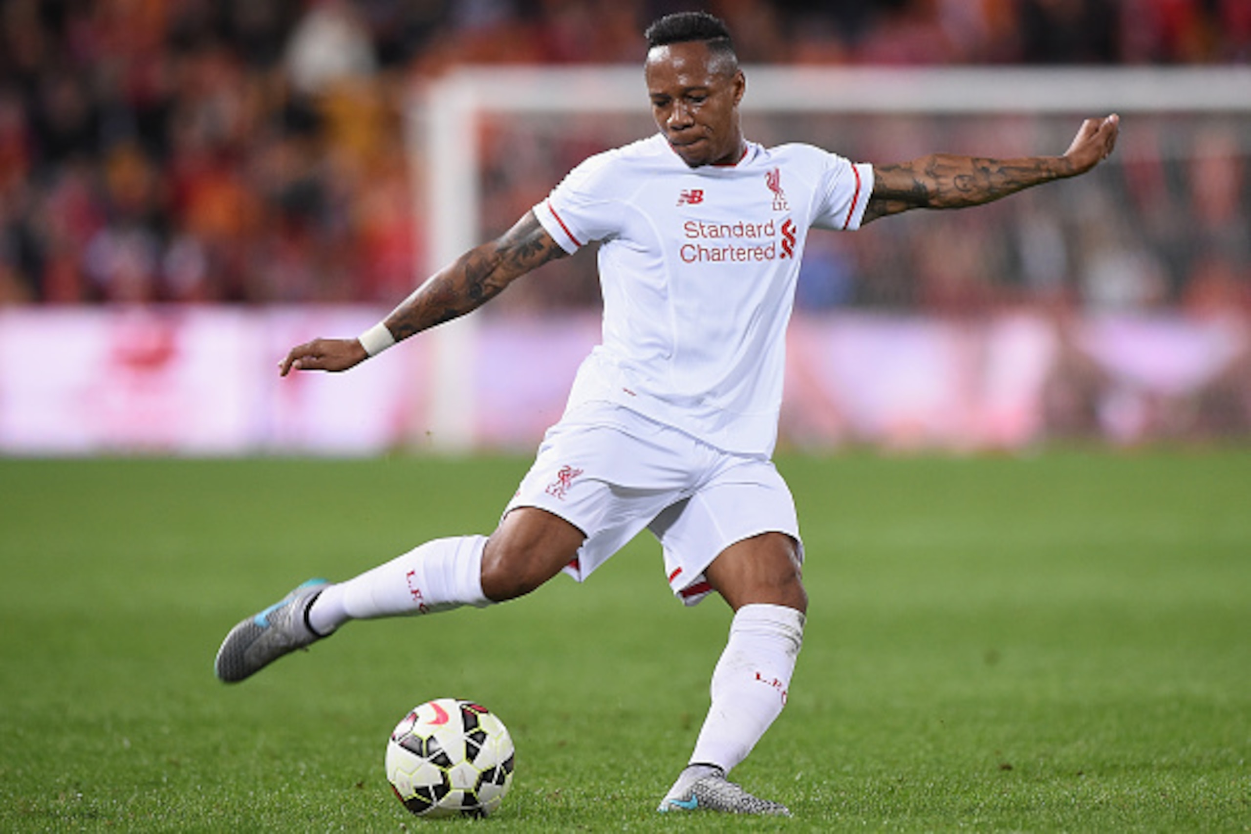BRISBANE, AUSTRALIA - JULY 17:  Nathaniel Clyne of Liverpool FC kicks the ball during the international friendly match between Brisbane Roar and Liverpool FC at Suncorp Stadium on July 17, 2015 in Brisbane, Australia.  (Photo by Matt Roberts/Getty Images)