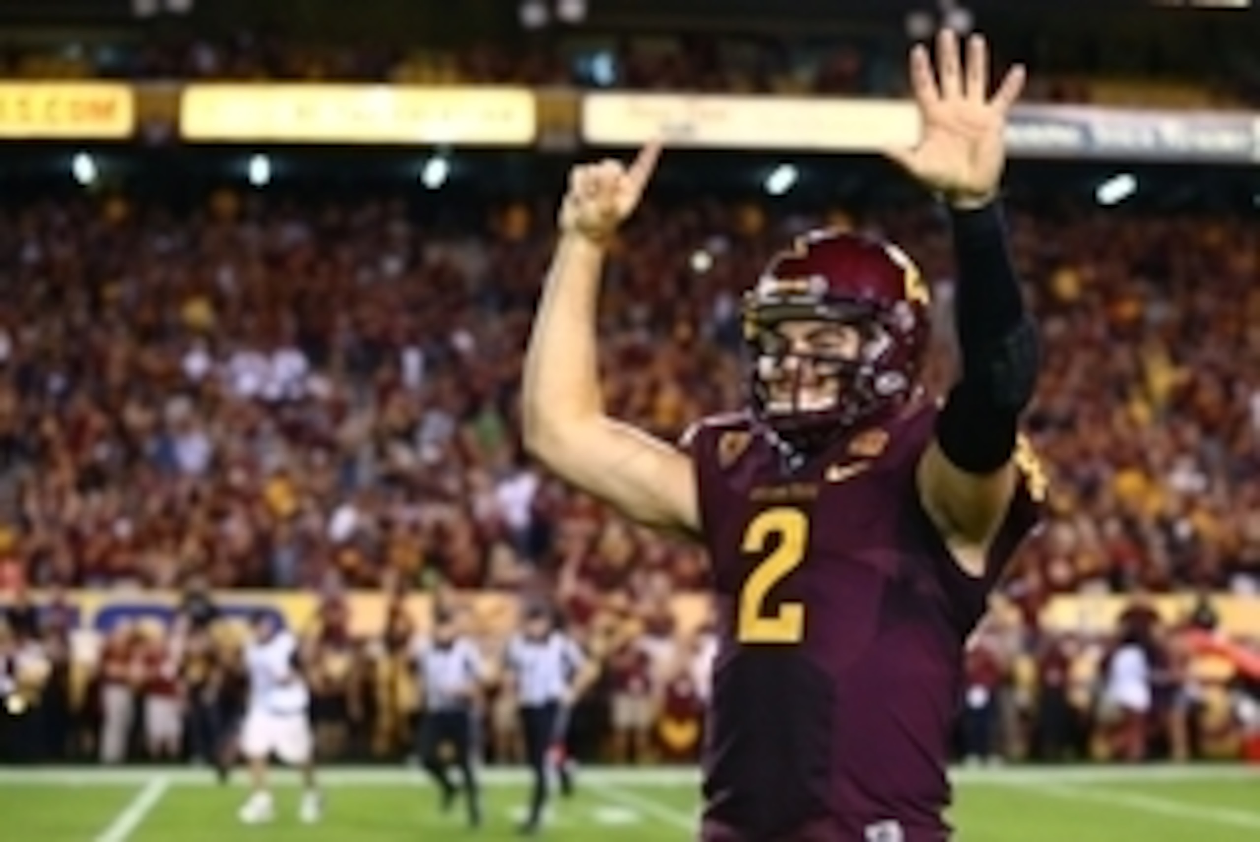 Oct 18, 2014; Tempe, AZ, USA; Arizona State Sun Devils quarterback Mike Bercovici (2) celebrates after defeating the Stanford Cardinal at Sun Devil Stadium. Mandatory Credit: Mark J. Rebilas-USA TODAY Sports