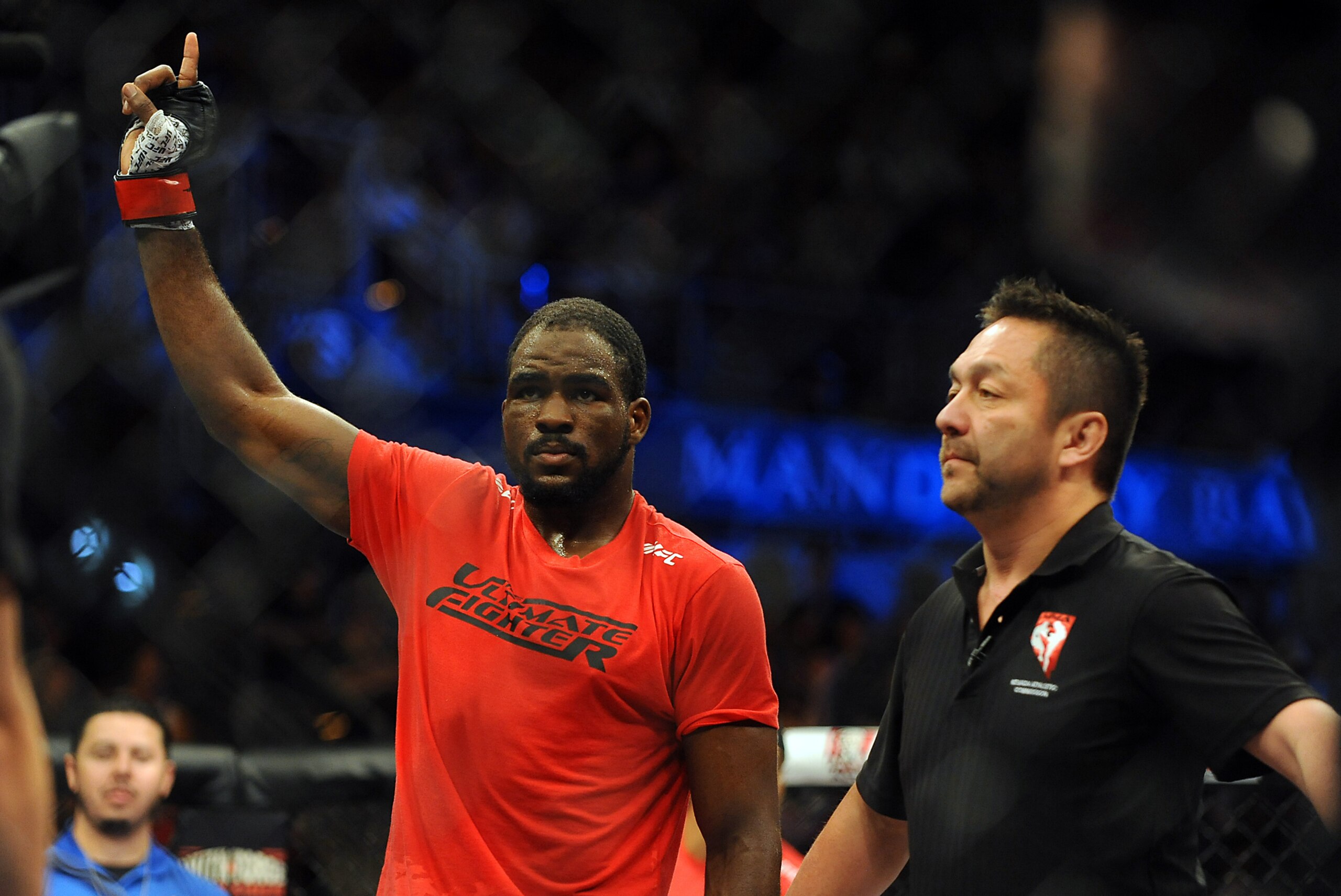 Jul 6, 2014; Las Vegas, NV, USA; Corey Anderson celebrates after a first round knockout victory over Matt Van Buren (not pictured) during an Ultimate Fighter light heavyweight title fight at Mandalay Bay Events Center. Mandatory Credit: Stephen R. Sylvani