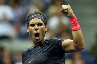 NEW YORK, NY - AUGUST 31:  Rafael Nadal of Spain celebrates a point in the fourth set against Borna Coric of Croatia during their Men's Singles First Round match on Day One of the 2015 US Open at the USTA Billie Jean King National Tennis Center on August 