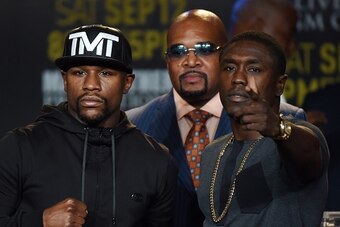 Boxers Floyd 'Money' Mayweather (L) and Andre Berto (R) face off during a press conference to officially announce their September 12 fight that will place at the MGM Grand Garden Arena in Las Vegas, at the Marriott Hotel in Los Angeles, California on Augu