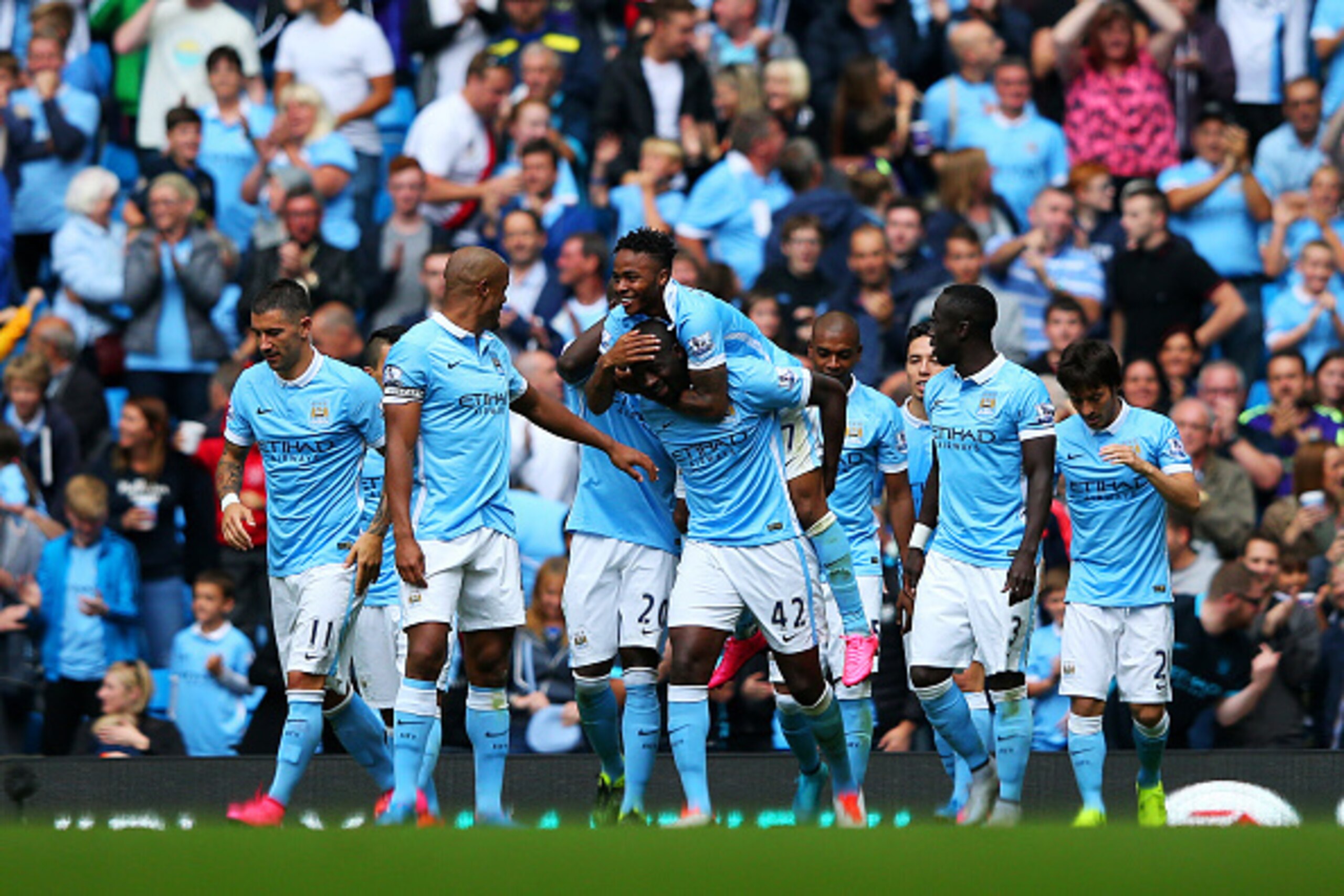 MANCHESTER, ENGLAND - AUGUST 29: Raheem Sterling of Manchester City celebrates scoring his team's first goal with his team mates during the Barclays Premier League match between Manchester City and Watford at Etihad Stadium on August 29, 2015 in Mancheste