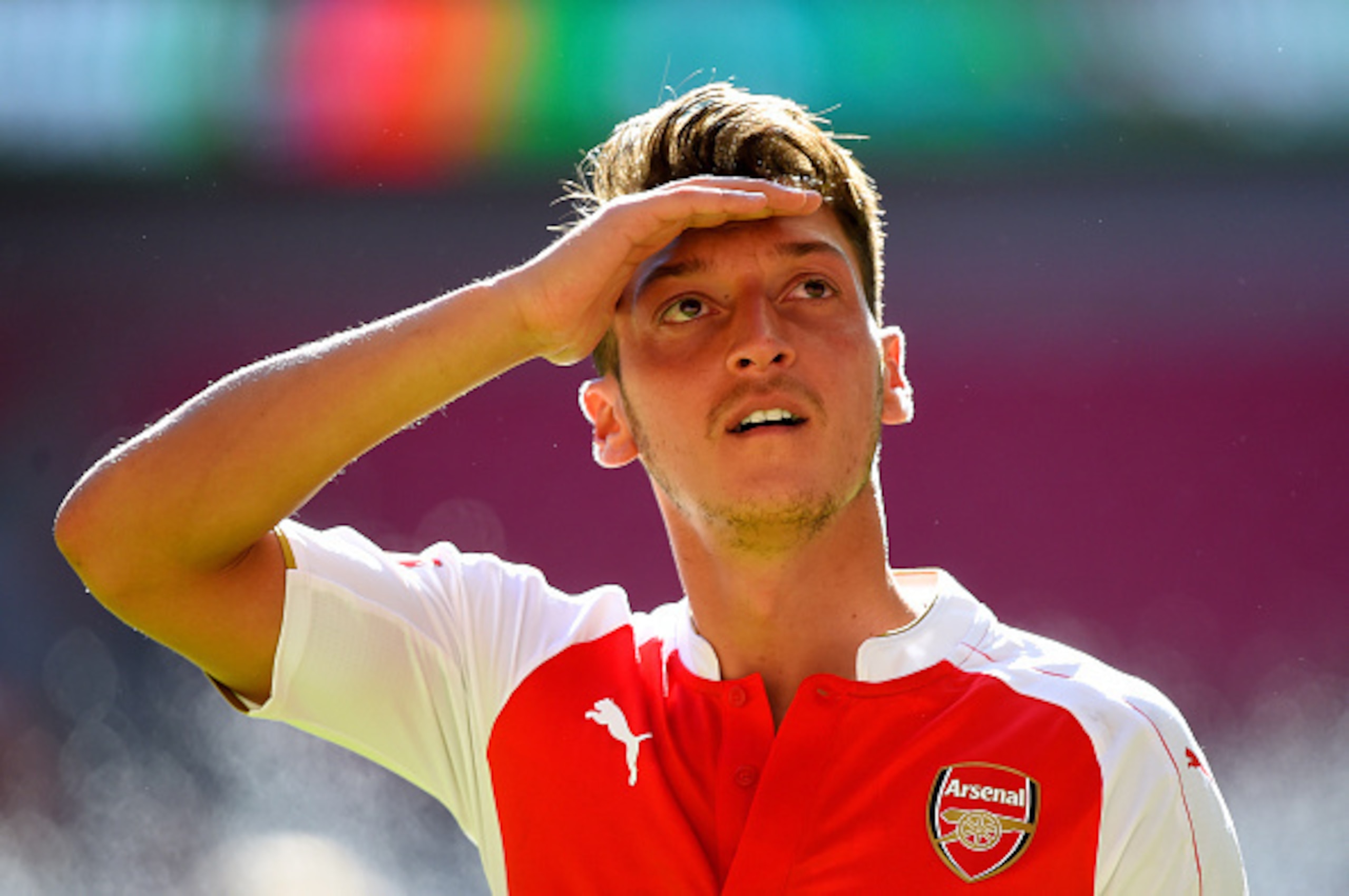 LONDON, ENGLAND - AUGUST 02:  Mesut Ozil of Arsenal celebrates his team's 1-0 win after the FA Community Shield match between Chelsea and Arsenal at Wembley Stadium on August 2, 2015 in London, England.  (Photo by Mike Hewitt/Getty Images)