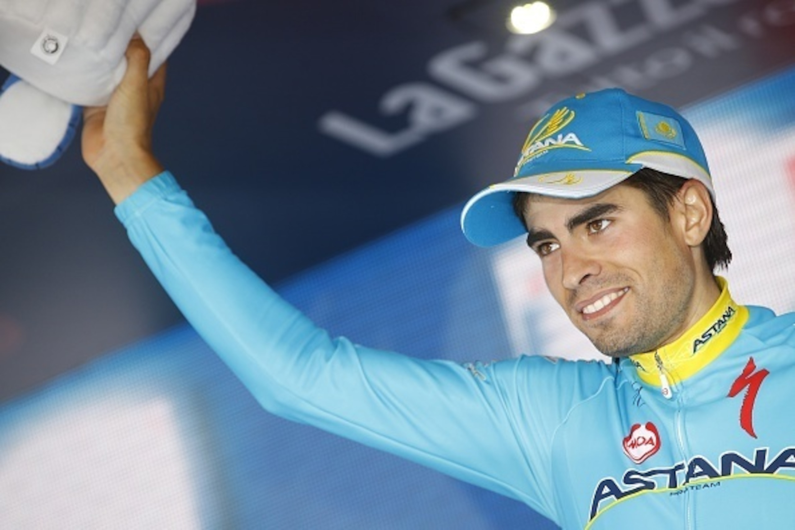 Spanish rider Mikel Landa celebrates on the podium after winning the 16th stage of the 98th Giro d'Italia, Tour of Italy, cycling race between Pinzolo and Aprica on May 26, 2015 in Aprica. Spaniard Alberto Contador took a massive step towards his second G