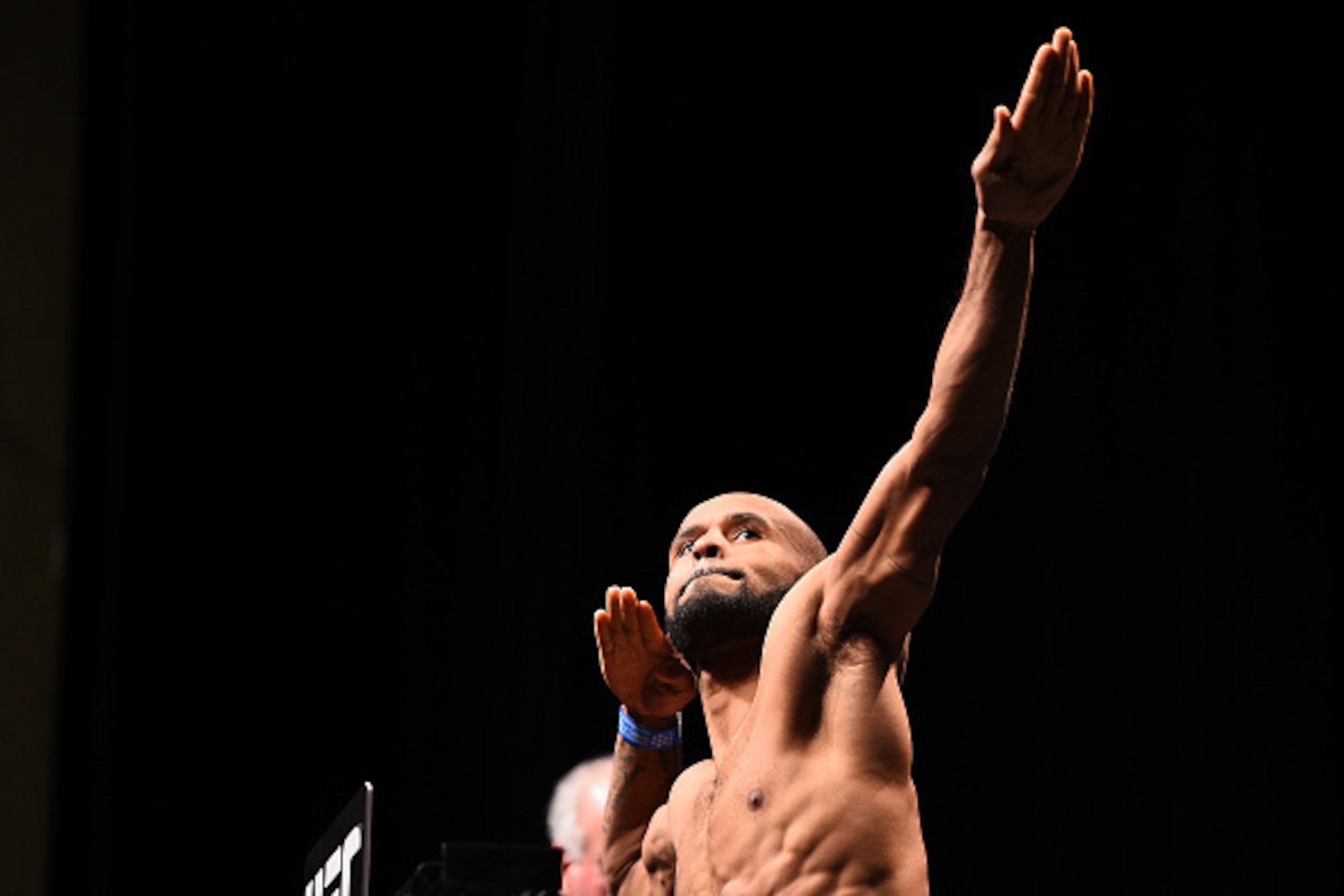 MONTREAL, QC - APRIL 24:  UFC flyweight champion Demetrious 'Mighty Mouse' Johnson steps on the scale during the UFC 186 weigh-in event at Metropolis on April 24, 2015 in Montreal, Quebec, Canada. (Photo by Jeff Bottari/Zuffa LLC/Zuffa LLC via Getty Image