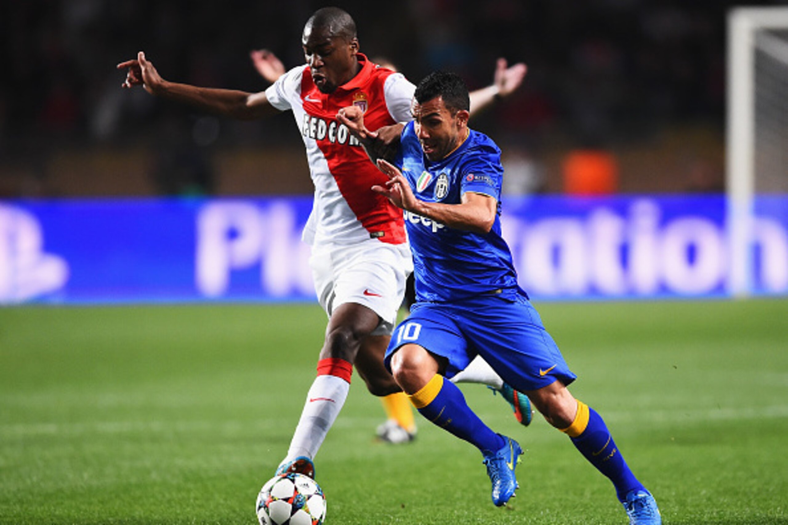 MONACO - APRIL 22: Carlos Tevez of Juventus takes on Geoffrey Kondogbia of Monaco during the UEFA Champions League quarter-final second leg match between AS Monaco FC and Juventus at Stade Louis II on April 22, 2015 in Monaco, Monaco. (Photo by Laurence MONACO - APRIL 22: Carlos Tevez of Juventus takes on Geoffrey Kondogbia of Monaco during the UEFA Champions League quarter-final second leg match between AS Monaco FC and Juventus at Stade Louis II on April 22, 2015 in Monaco, Monaco. (Photo by Laurence