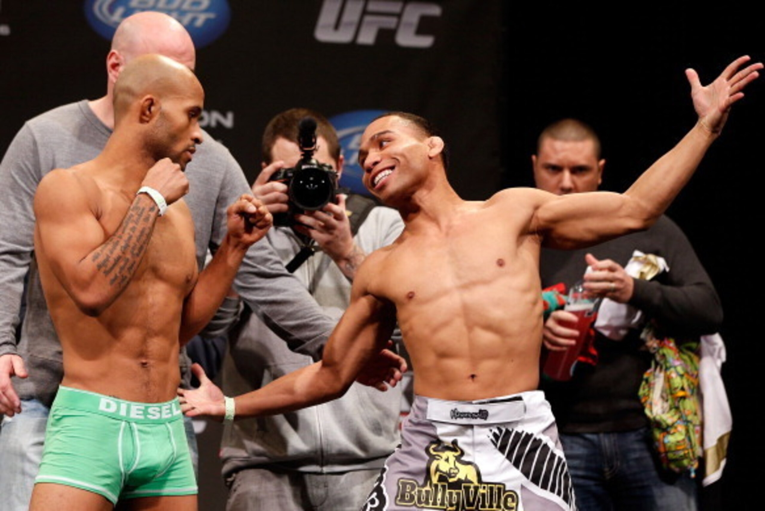 CHICAGO, IL - JANUARY 25:  (L-R) Opponents Demetrious Johnson and John Dodson face off during the UFC on FOX weigh-in on January 25, 2013 at the Chicago Theatre in Chicago, Illinois. (Photo by Josh Hedges/Zuffa LLC/Zuffa LLC via Getty Images)