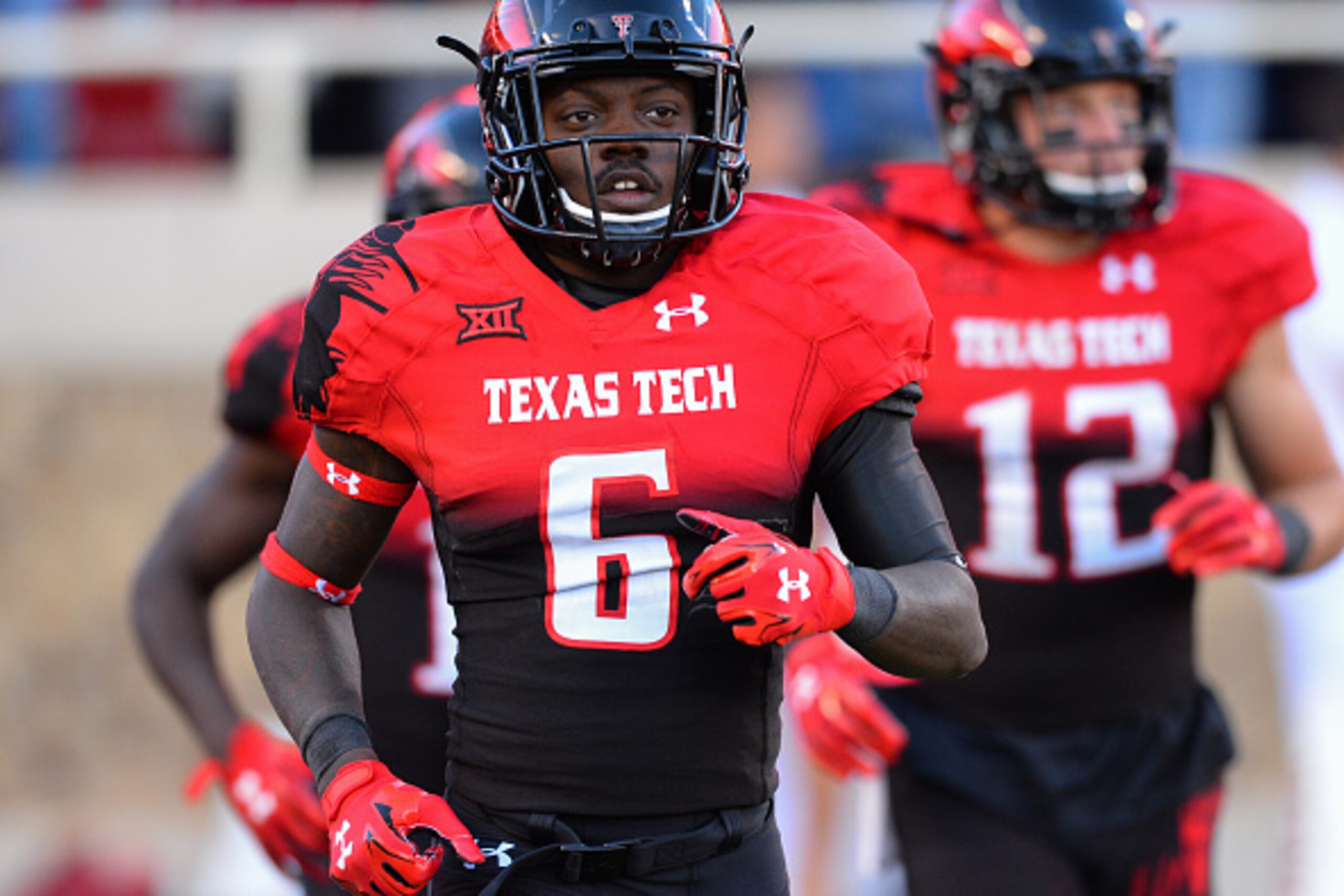 LUBBOCK, TX - NOVEMBER 15: Devin Lauderdale #6 of the Texas Tech Red Raiders during the game against the Oklahoma Sooners on November 15, 2014 at Jones AT&T Stadium in Lubbock, Texas. Oklahoma won the game 42-30. (Photo by John Weast/Getty Images)