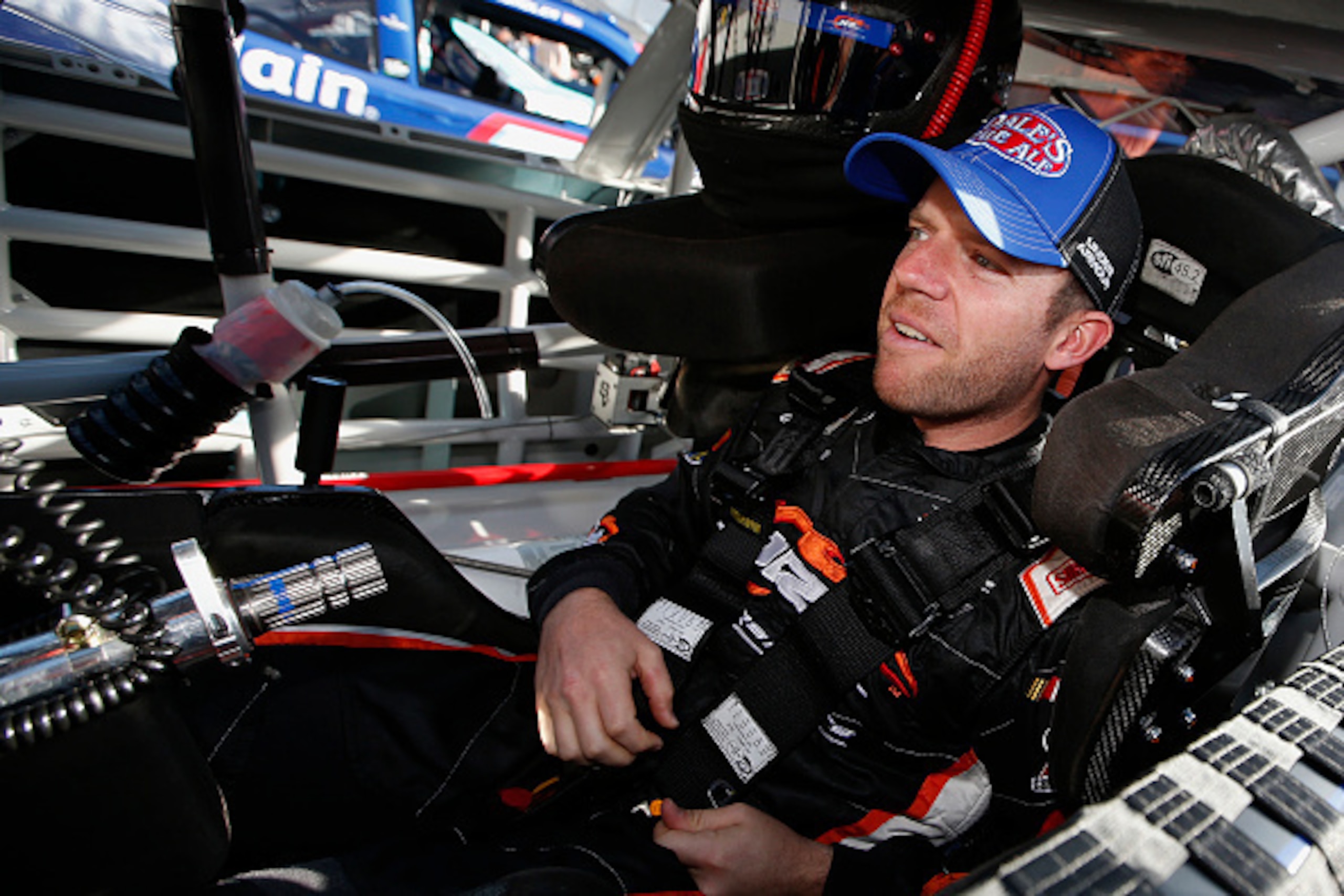 BRISTOL, TN - AUGUST 21: Regan Smith, driver of the #7 Dale's Pale Ale Chevrolet, sits in his car during practice for the NASCAR XFINITY Series Food City 300 at Bristol Motor Speedway on August 21, 2015 in Bristol, Tennessee.  (Photo by Gregory Shamus/Get