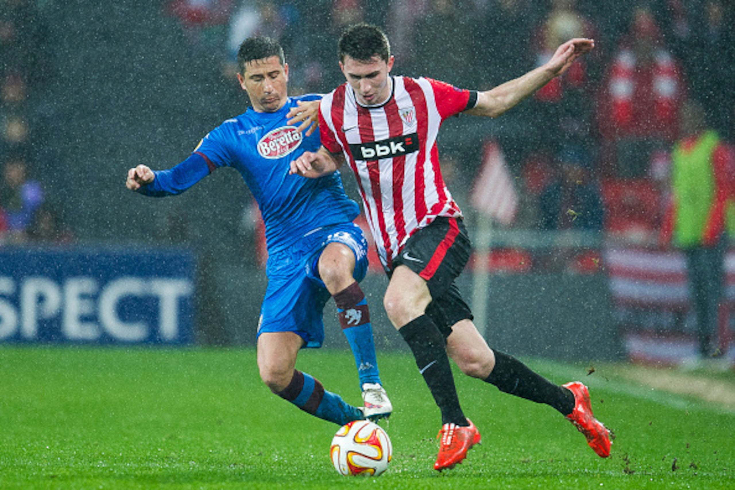 BILBAO, SPAIN - FEBRUARY 26: Giuseppe Vives of Torino FC duels for the ball with Aimeric Laporte of Athletic Club during the UEFA Europa League Round of 32 match between Athletic Club and Torino FC on at San Mames Stadium on February 26, 2015 in Bilbao, BILBAO, SPAIN - FEBRUARY 26: Giuseppe Vives of Torino FC duels for the ball with Aimeric Laporte of Athletic Club during the UEFA Europa League Round of 32 match between Athletic Club and Torino FC on at San Mames Stadium on February 26, 2015 in Bilbao,