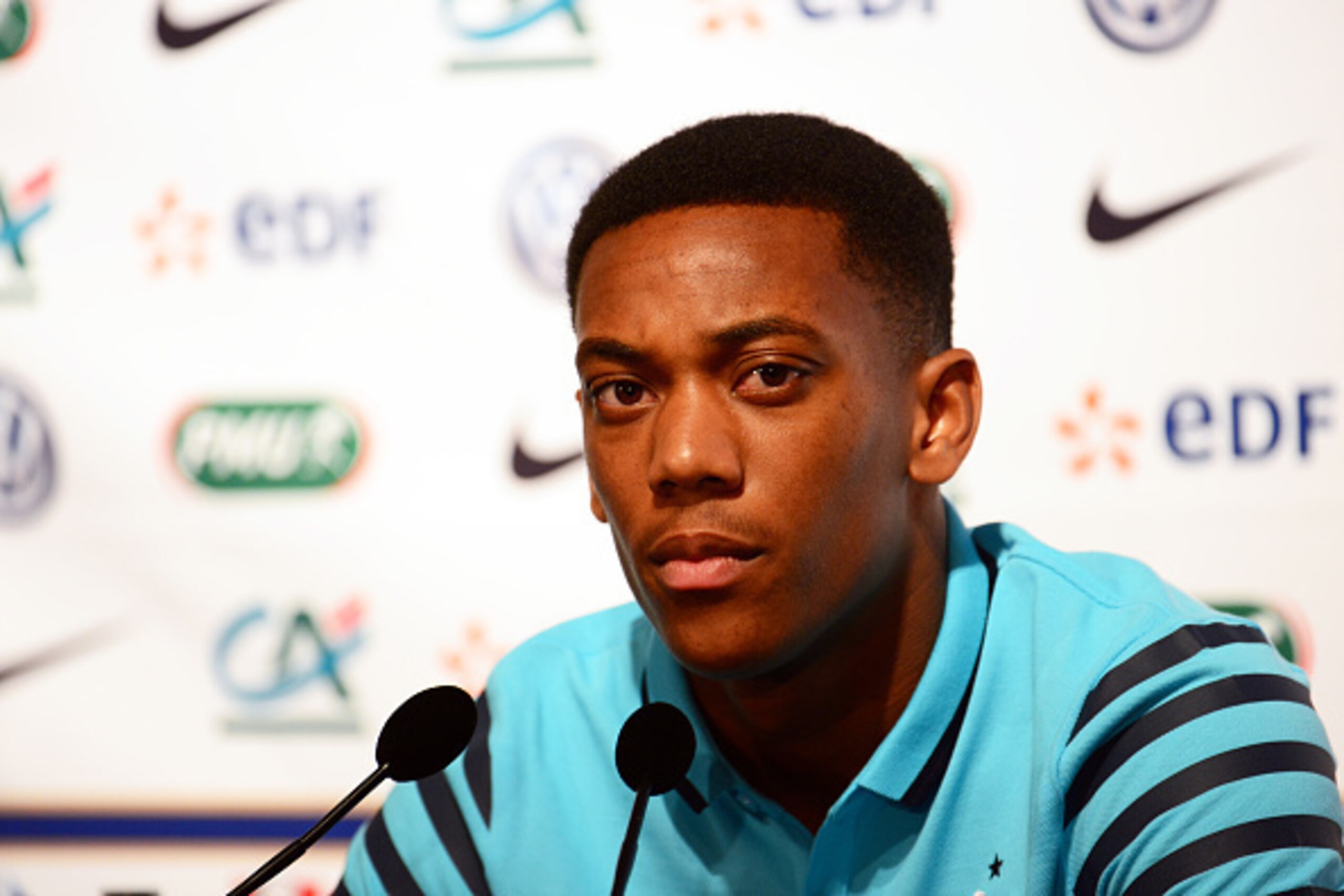 CLAIREFONTAINE, FRANCE - SEPTEMBER 02:  France's national football team forward Anthony Martial speaks during a press conference two days ahead of the friendly match against Portugal on September 2, 2015 in Clairefontaine, France. (Photo by Frederic Steve