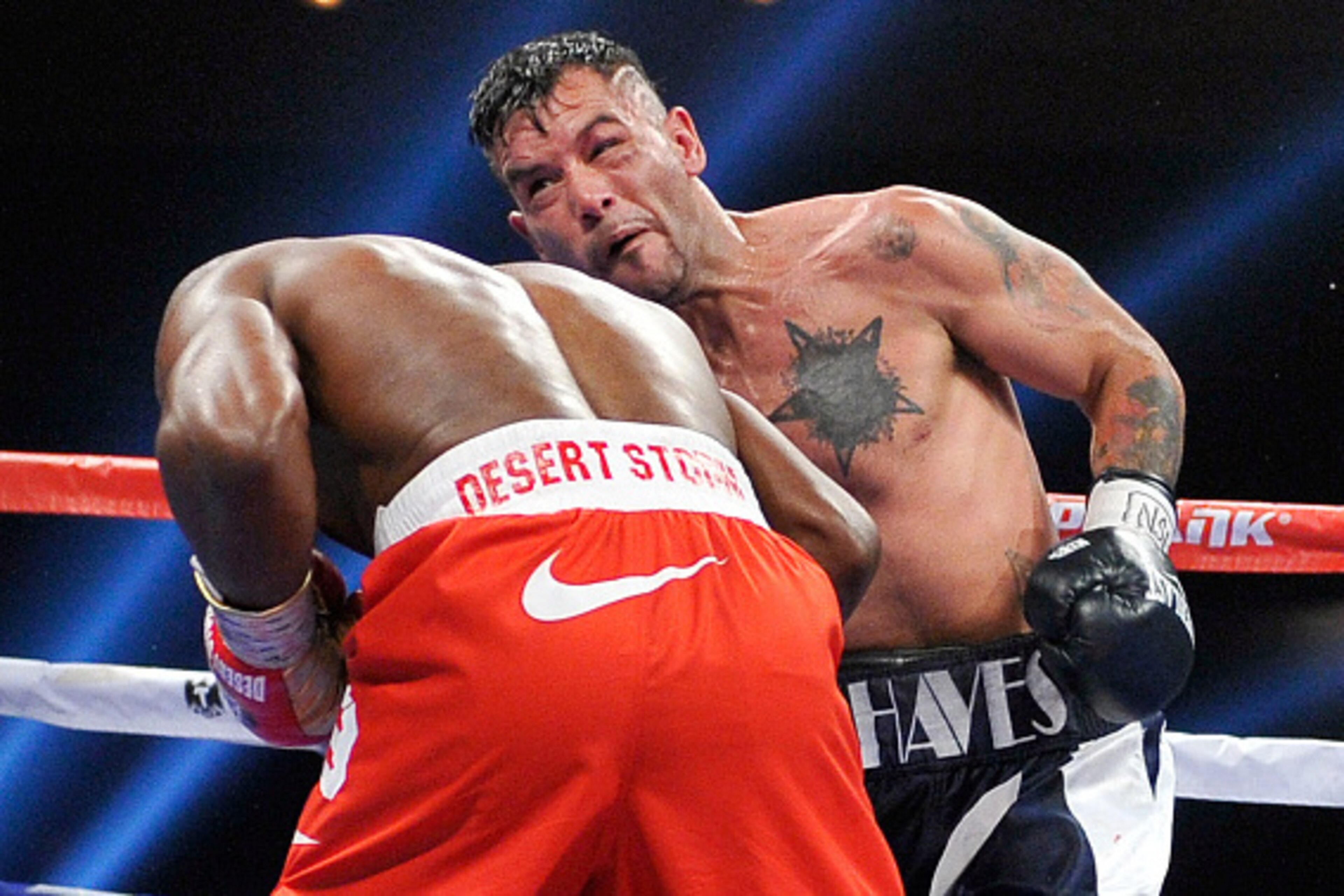 LAS VEGAS, NV - DECEMBER 13:  Diego Chaves (R) punches Timothy Bradley Jr. during their welterweight bout at The Chelsea at The Cosmopolitan of Las Vegas on December 13, 2014 in Las Vegas, Nevada. The 12-round fight ended in a draw.  (Photo by David Becke