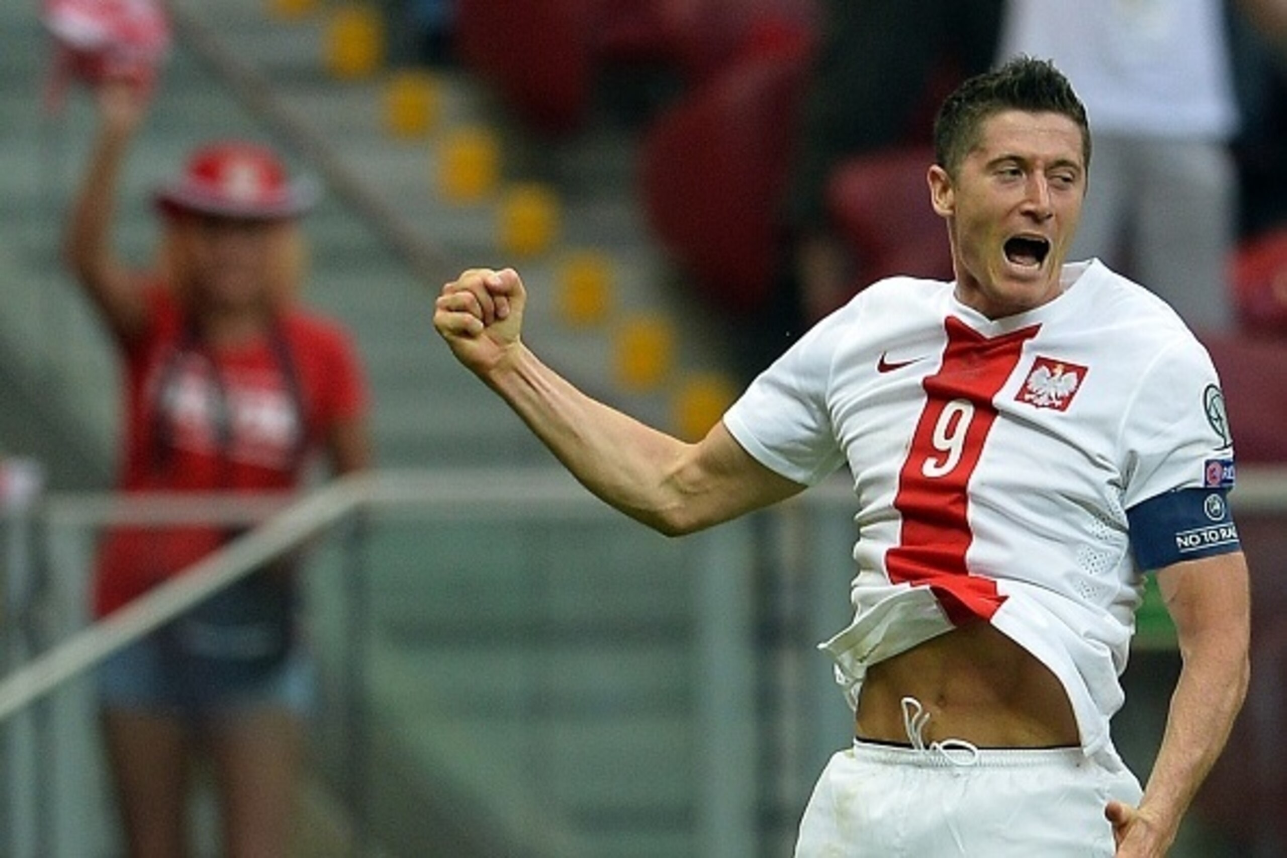 Robert Lewandowski of Poland reacts after scoring a goal during the Euro 2016 Group D qualifying football match Poland vs Georgia in Warsaw, Poland on June 13, 2015.  AFP PHOTO / JANEK SKARZYNSKI        (Photo credit should read JANEK SKARZYNSKI/AFP/Getty