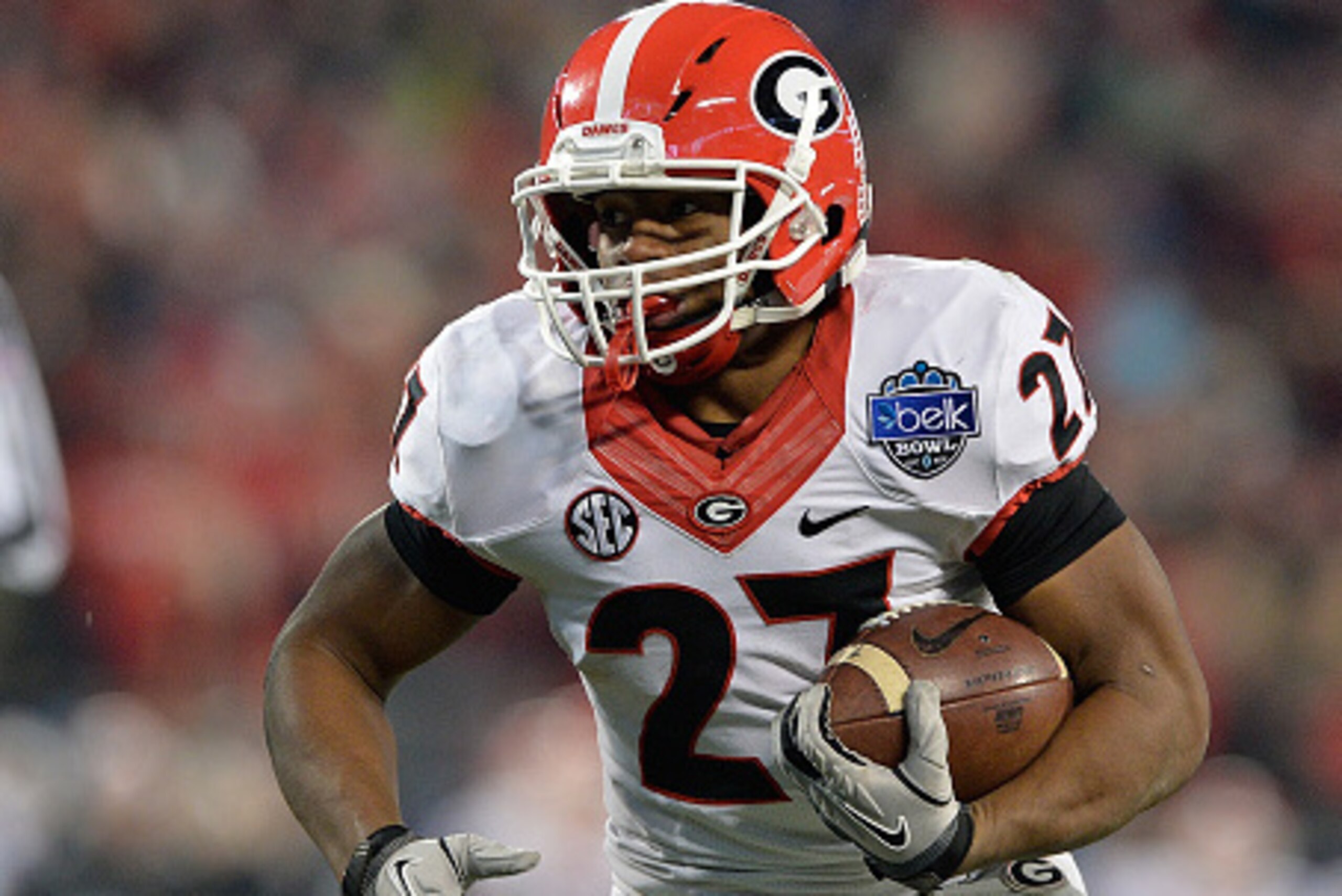 CHARLOTTE, NC - DECEMBER 30:  Nick Chubb #27 of the Georgia Bulldogs rus against the Louisville Cardinals during the Belk Bowl at Bank of America Stadium on December 30, 2014 in Charlotte, North Carolina. Georgia won 37-14.  (Photo by Grant Halverson/Gett