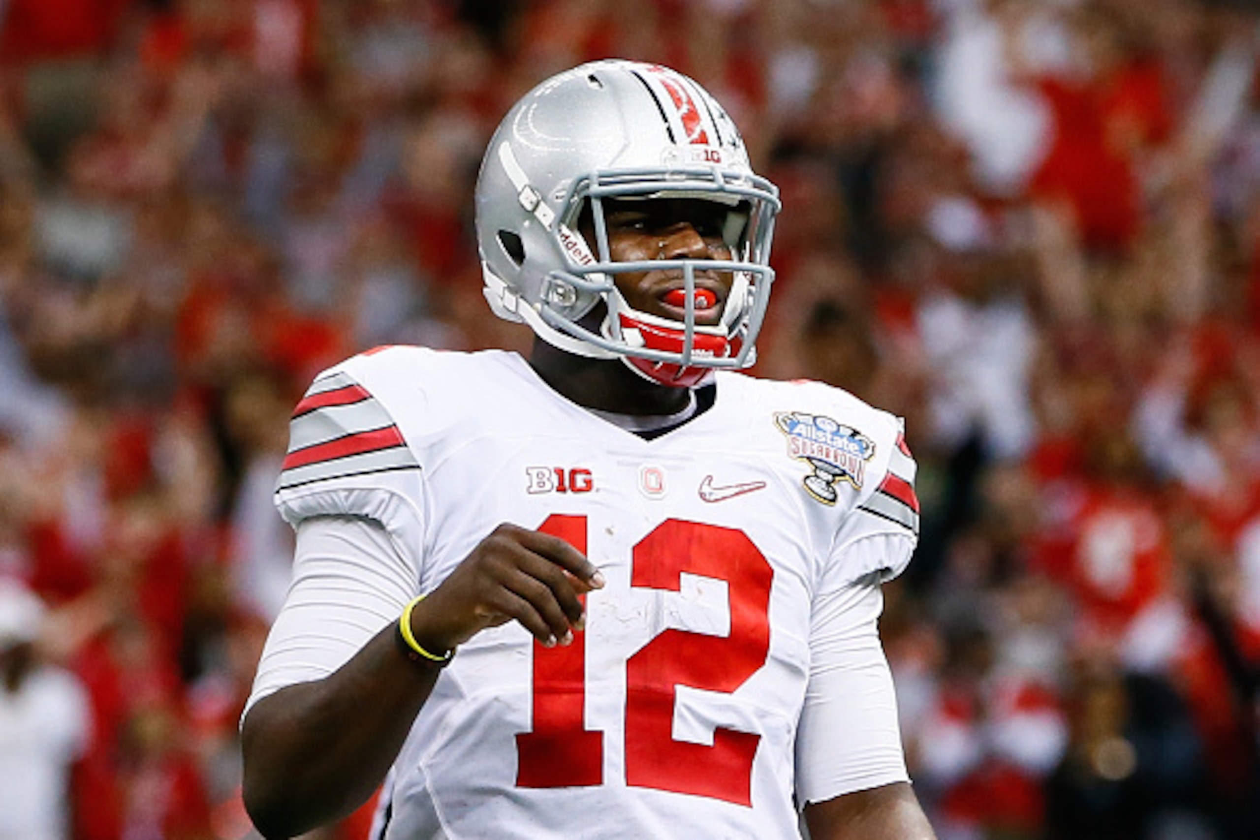 NEW ORLEANS, LA - JANUARY 01:  Cardale Jones #12 of the Ohio State Buckeyes reacts after a two point conversion in the fourth quarter against the Alabama Crimson Tide during the All State Sugar Bowl at the Mercedes-Benz Superdome on January 1, 2015 in New