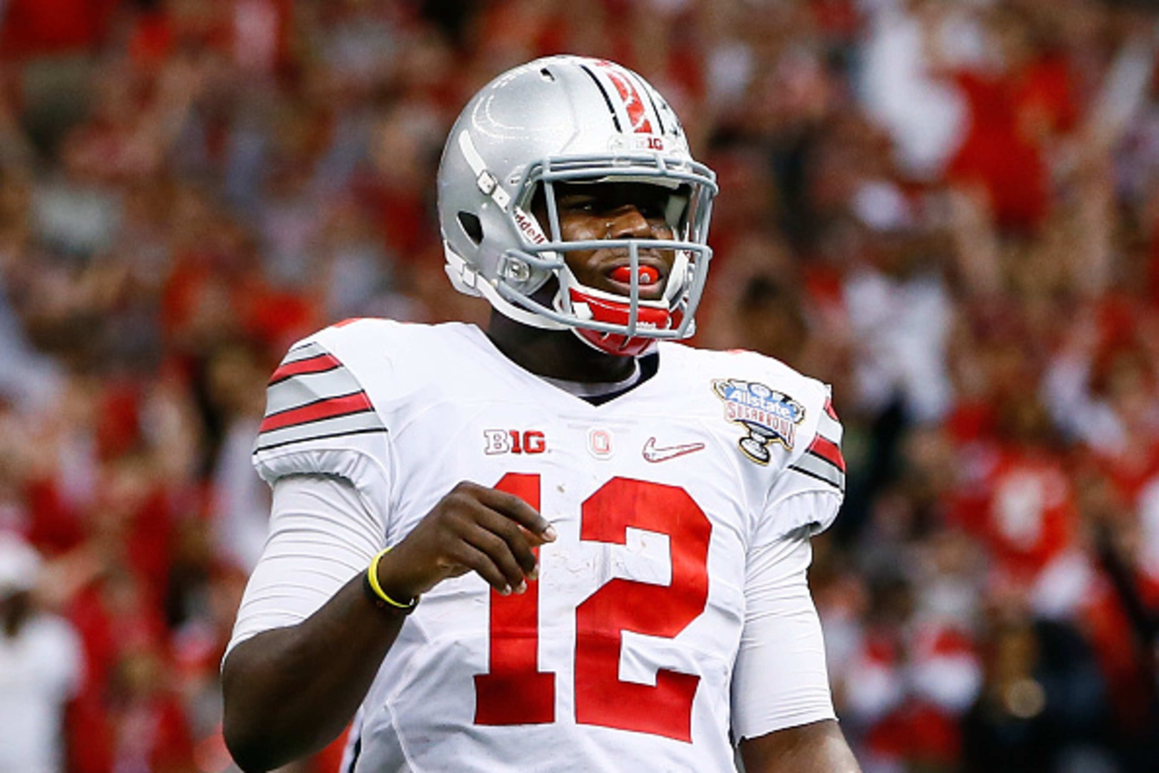 NEW ORLEANS, LA - JANUARY 01:  Cardale Jones #12 of the Ohio State Buckeyes reacts after a two point conversion in the fourth quarter against the Alabama Crimson Tide during the All State Sugar Bowl at the Mercedes-Benz Superdome on January 1, 2015 in New