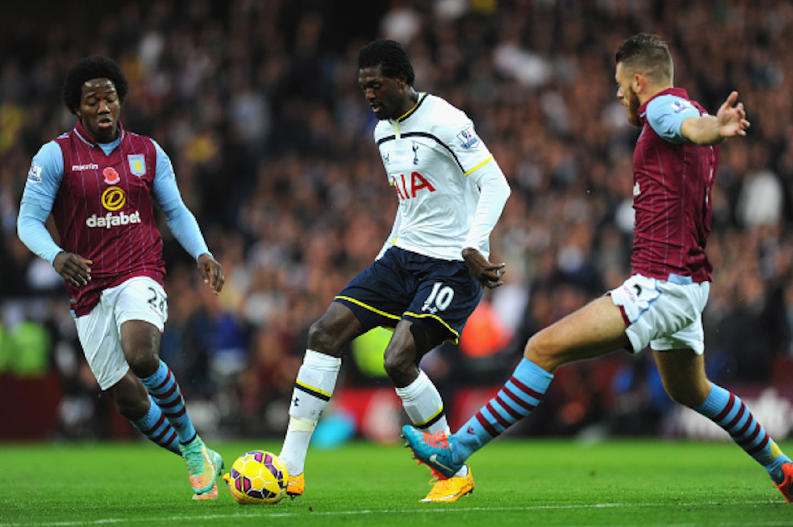 BIRMINGHAM, ENGLAND - NOVEMBER 02:  Emmanuel Adebayor (c) of Tottenham Hotspur in action during the Barclays Premier League match between Aston Villa and Tottenham Hotspur at Villa Park on November 2, 2014 in Birmingham, England.  (Photo by Stu Forster/Ge