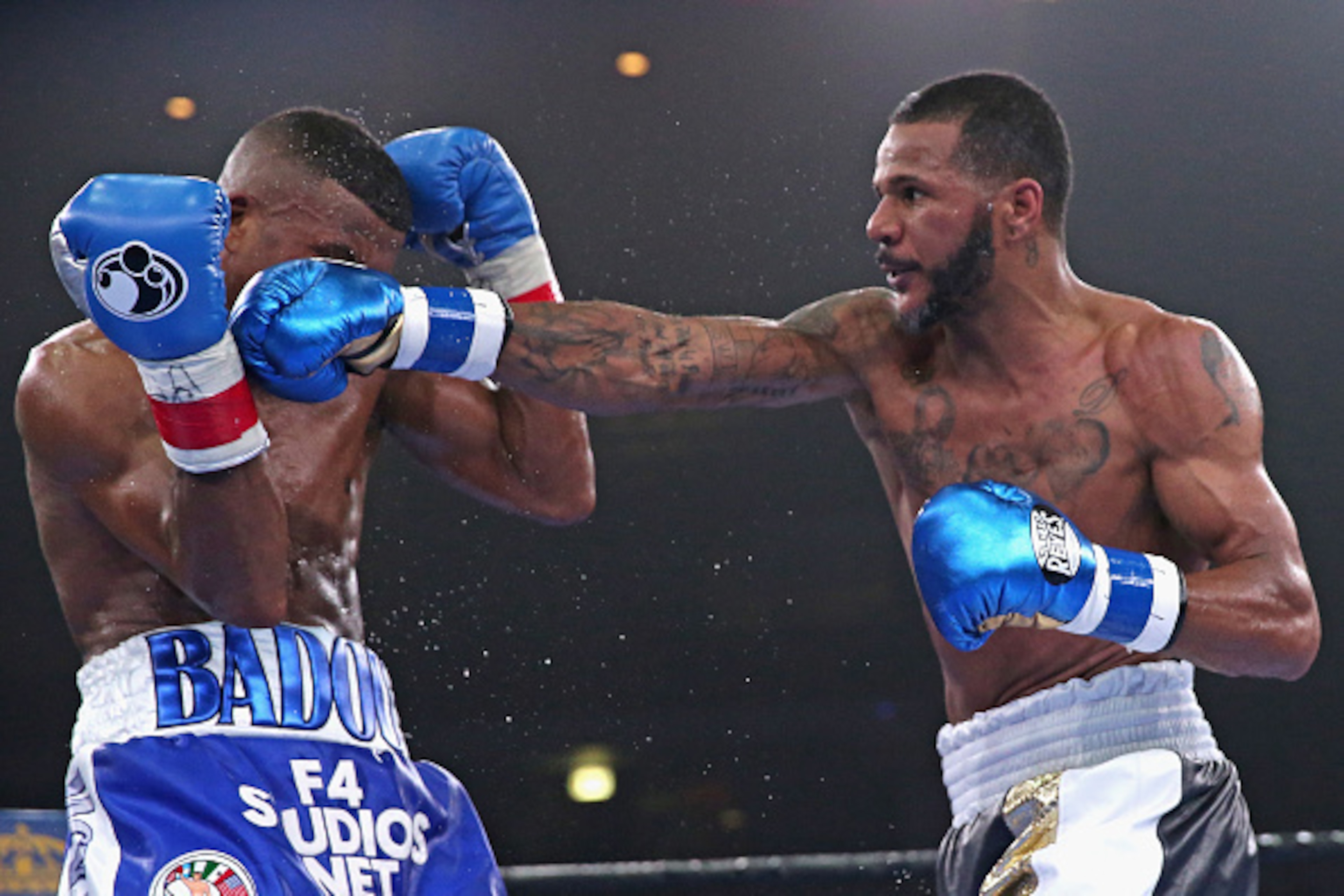 CHICAGO, IL - APRIL 24:  Anthony Dirrell connects with Badou Jack during a super middleweight fight at the UIC Pavilion on April 24, 2015 in Chicago, Illinois.  (Photo by Jonathan Daniel/Getty Images)
