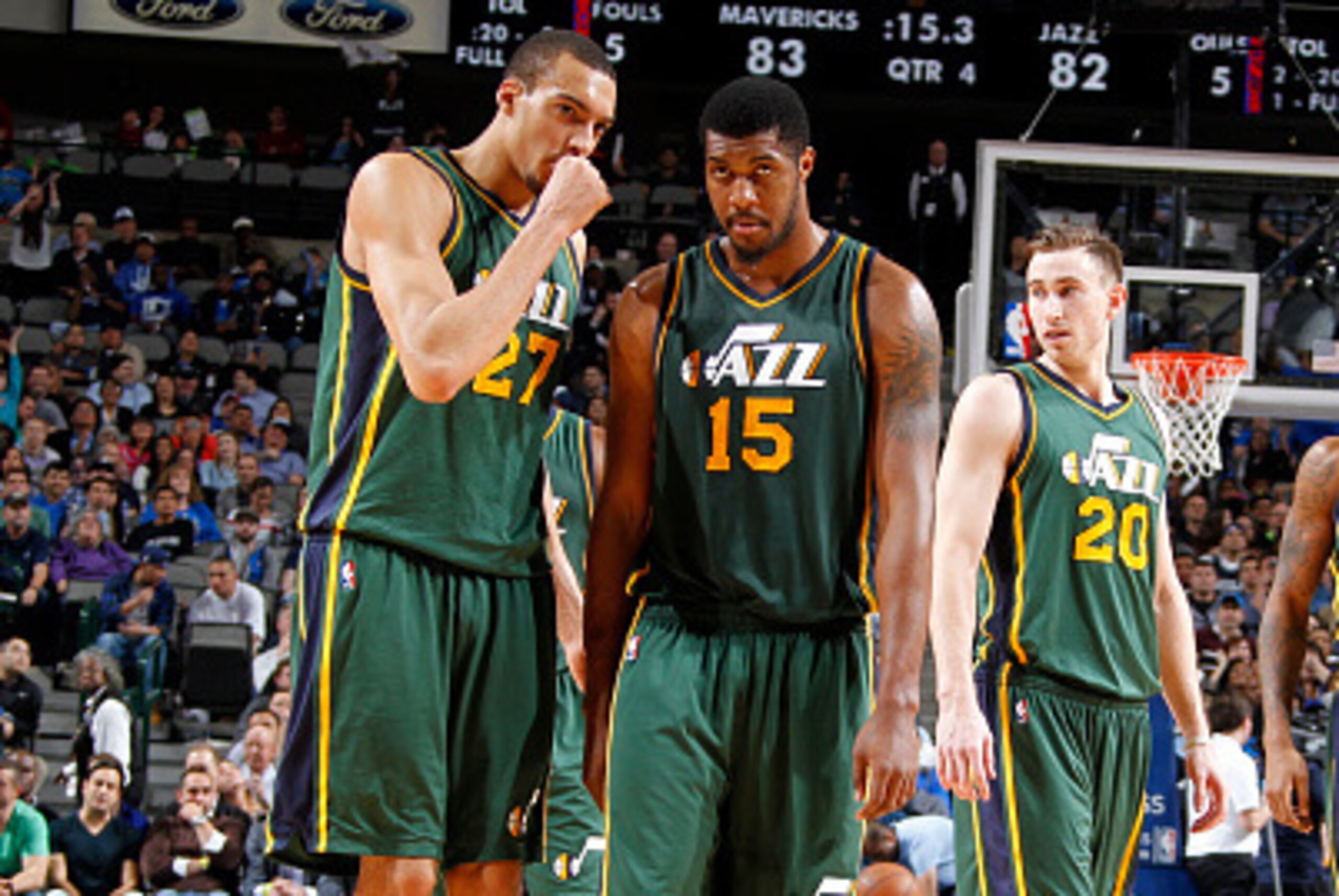 DALLAS, TX - FEBRUARY 11: Rudy Gobert #27, Derrick Favors #15, Gordon Hayward #20, and Trevor Booker #33 of the Utah Jazz stand on the court during a game against the Dallas Mavericks on February 11, 2015 at the American Airlines Center in Dallas, Texas. 