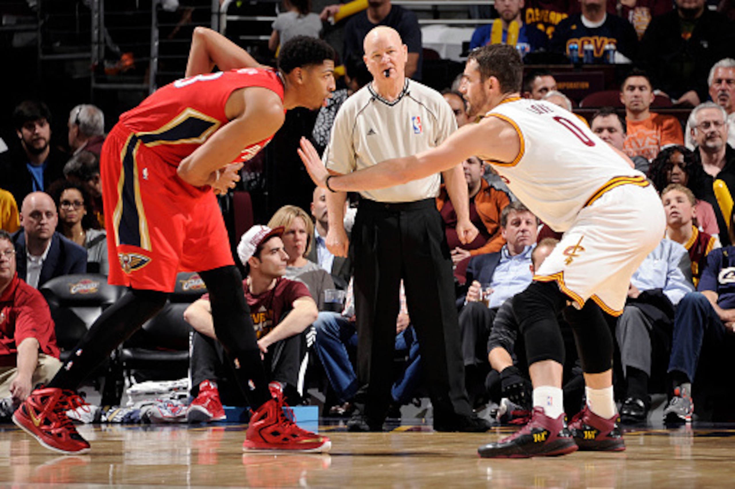 CLEVELAND, OH - NOVEMBER 10: Anthony Davis #23 of the New Orleans Pelicans defends the ball against Kevin Love #0 of the Cleveland Cavaliers during the game on November 10, 2014 at Quicken Loans Arena in Cleveland, Ohio. NOTE TO USER: User expressly ackno