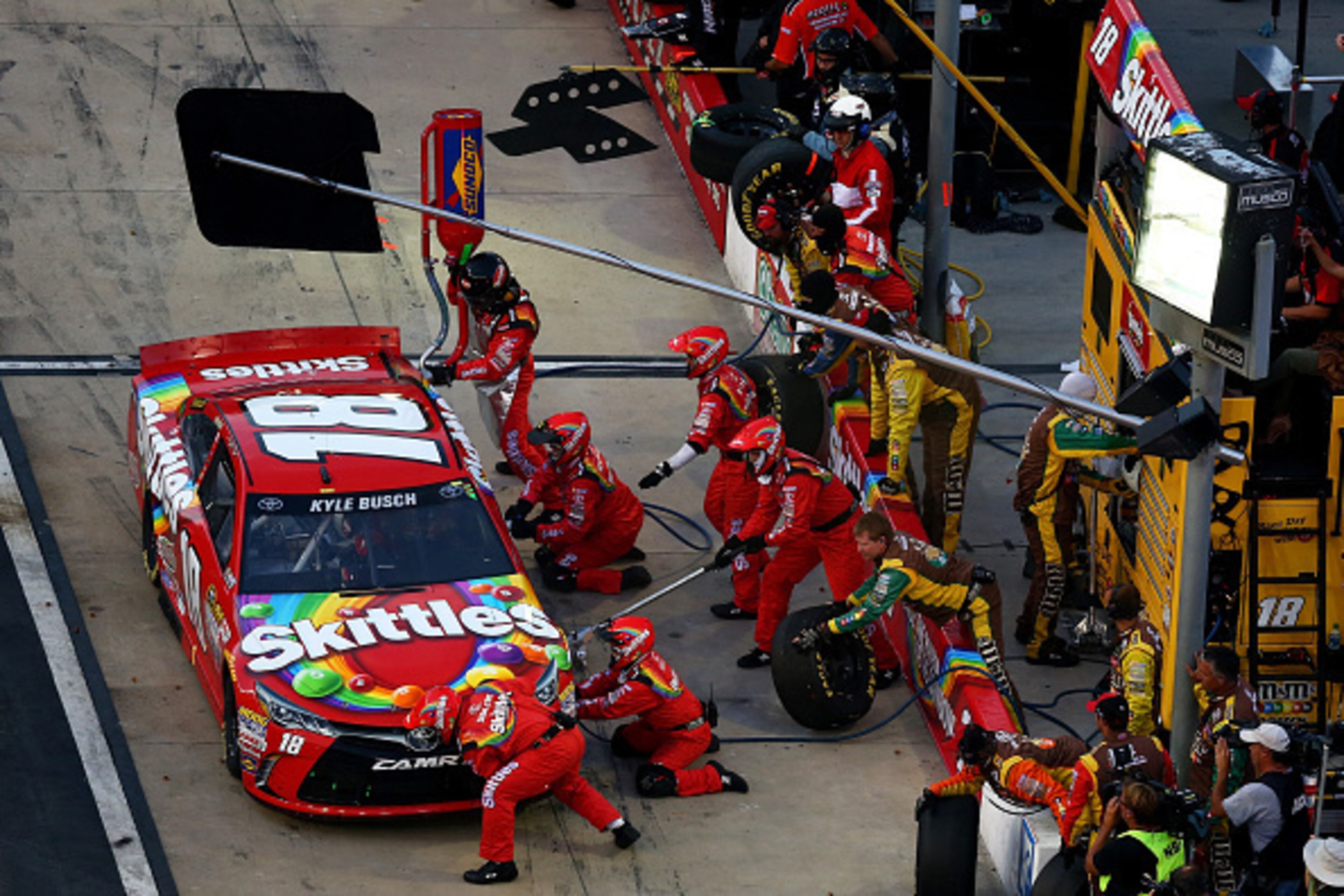 BRISTOL, TN - AUGUST 22:  Kyle Busch, driver of the #18 Skittles Toyota, pits during the NASCAR Sprint Cup Series IRWIN Tools Night Race at Bristol Motor Speedway on August 22, 2015 in Bristol, Tennessee.  (Photo by Tom Pennington/Getty Images)
