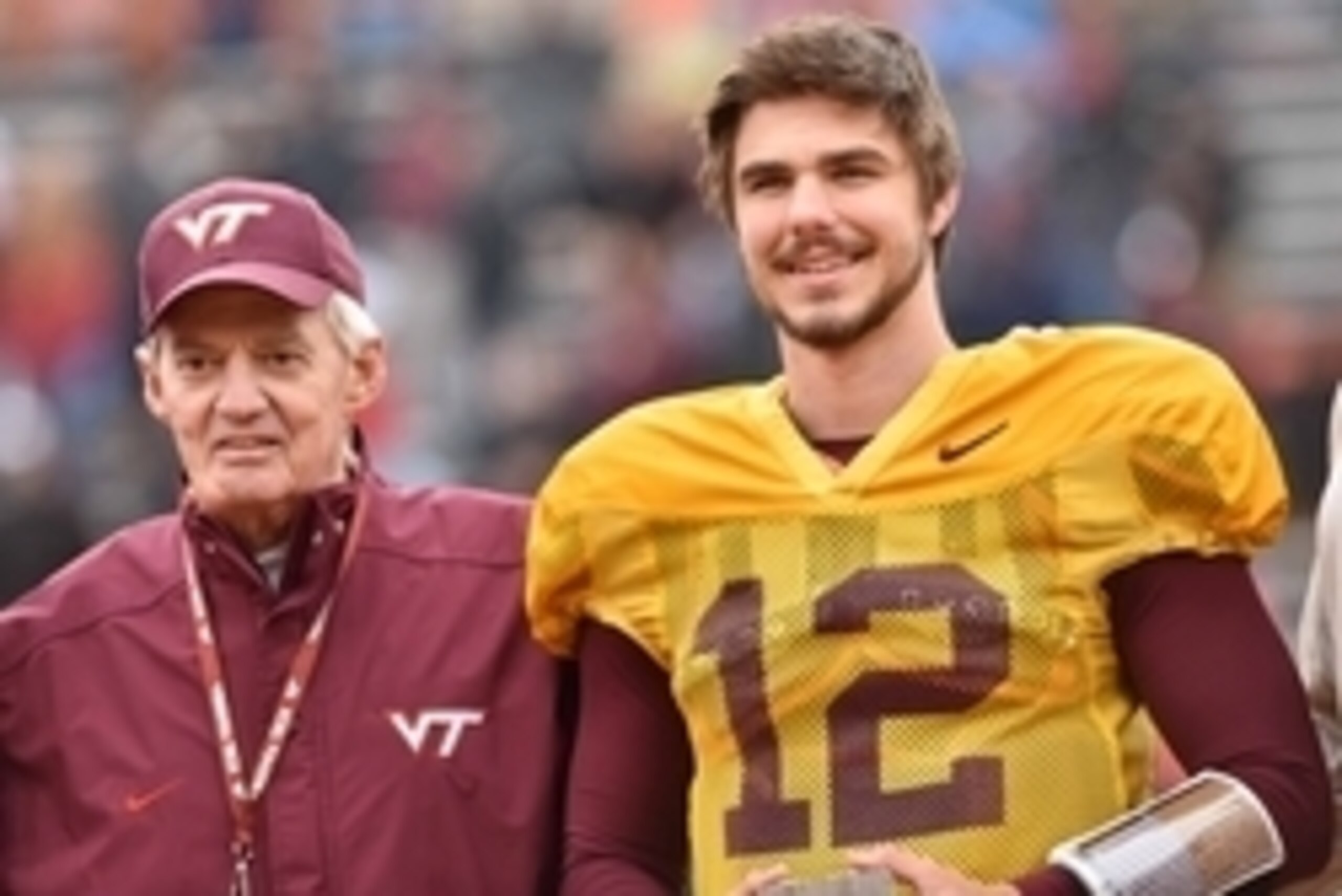 Apr 25, 2015; Blacksburg, VA, USA; Virginia Tech Hokies quarterback Michael Brewer (12) stands with head coach Frank Beamer during halftime of the Orange Maroon spring game at Lane Stadium. Mandatory Credit: Michael Shroyer-USA TODAY Sports