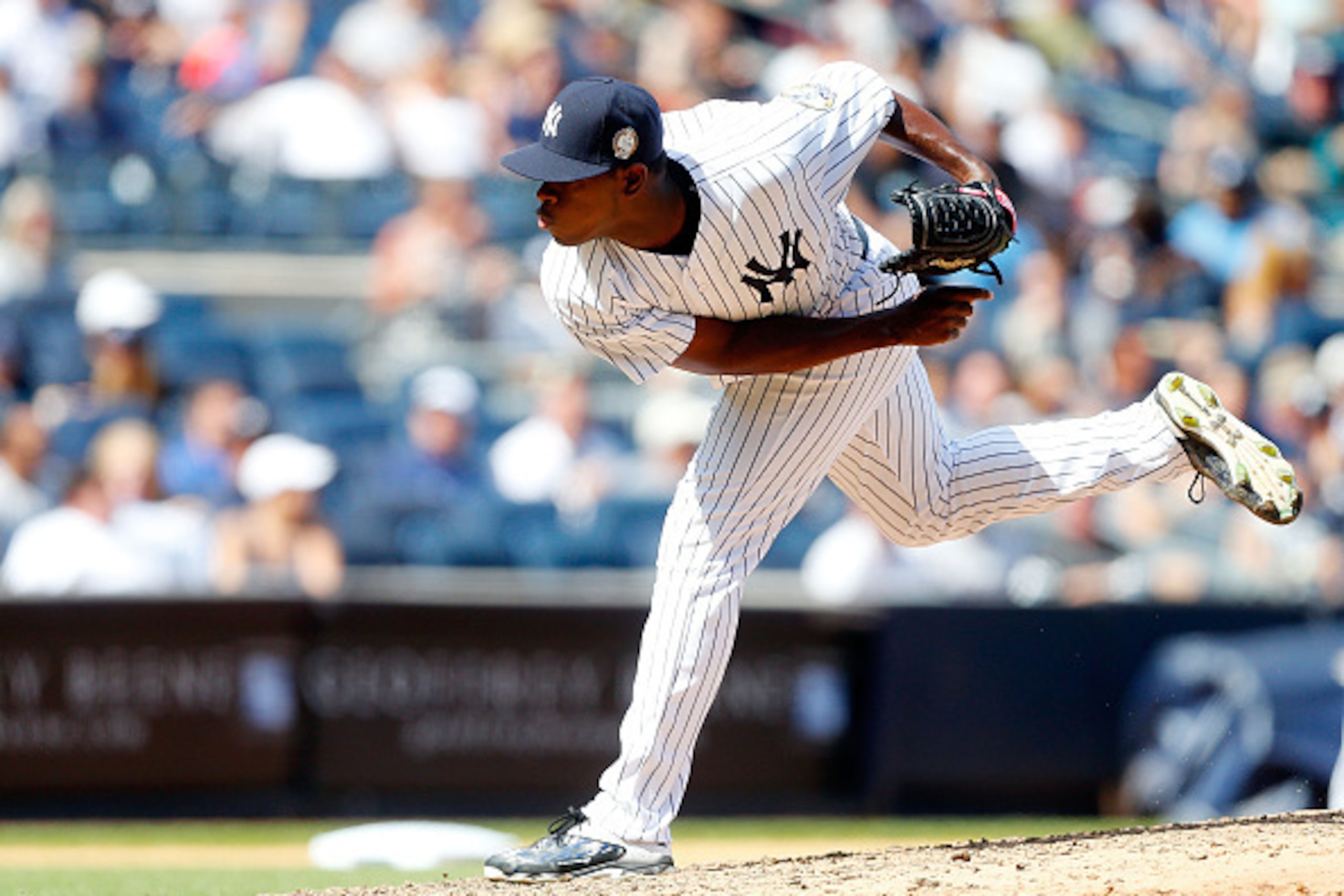 NEW YORK, NY - AUGUST 22:  Luis Severino #40 of the New York Yankees in action against the Cleveland Indians at Yankee Stadium on August 22, 2015 in the Bronx borough of New York City. The Yankees defeated the Indians 6-2.  (Photo by Jim McIsaac/Getty Ima