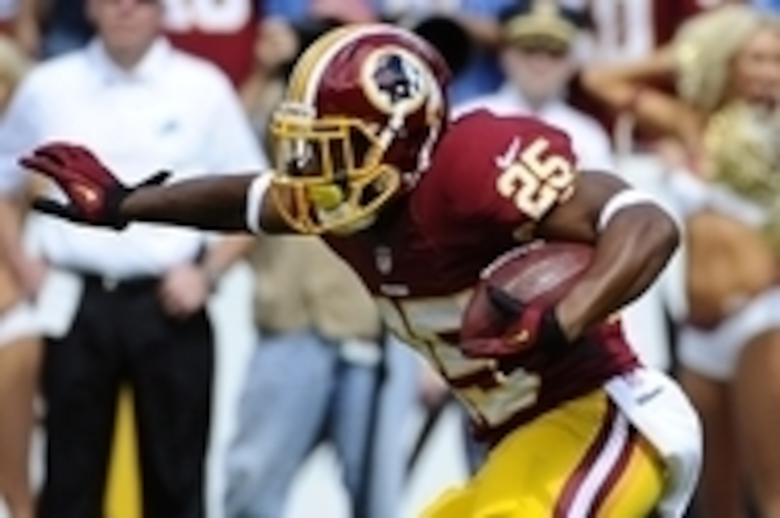 Sep 22, 2013; Landover, MD, USA; Washington Redskins running back Chris Thompson (25) returns a kick during the first half against the Detriot Lions at FedEX Field. Mandatory Credit: Brad Mills-USA TODAY Sports
