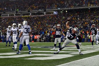 FOXBORO, MA - JANUARY 18:  Rob Gronkowski #87 of the New England Patriots spikes the ball after his third quarter touchdown against the Indianapolis Colts of the 2015 AFC Championship Game at Gillette Stadium on January 18, 2015 in Foxboro, Massachusetts.