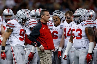 NEW ORLEANS, LA - JANUARY 01:  Head coach Urban Meyer of the Ohio State Buckeyes looks on from the sidelines during the All State Sugar Bowl at the Mercedes-Benz Superdome on January 1, 2015 in New Orleans, Louisiana.  (Photo by Sean Gardner/Getty Images)