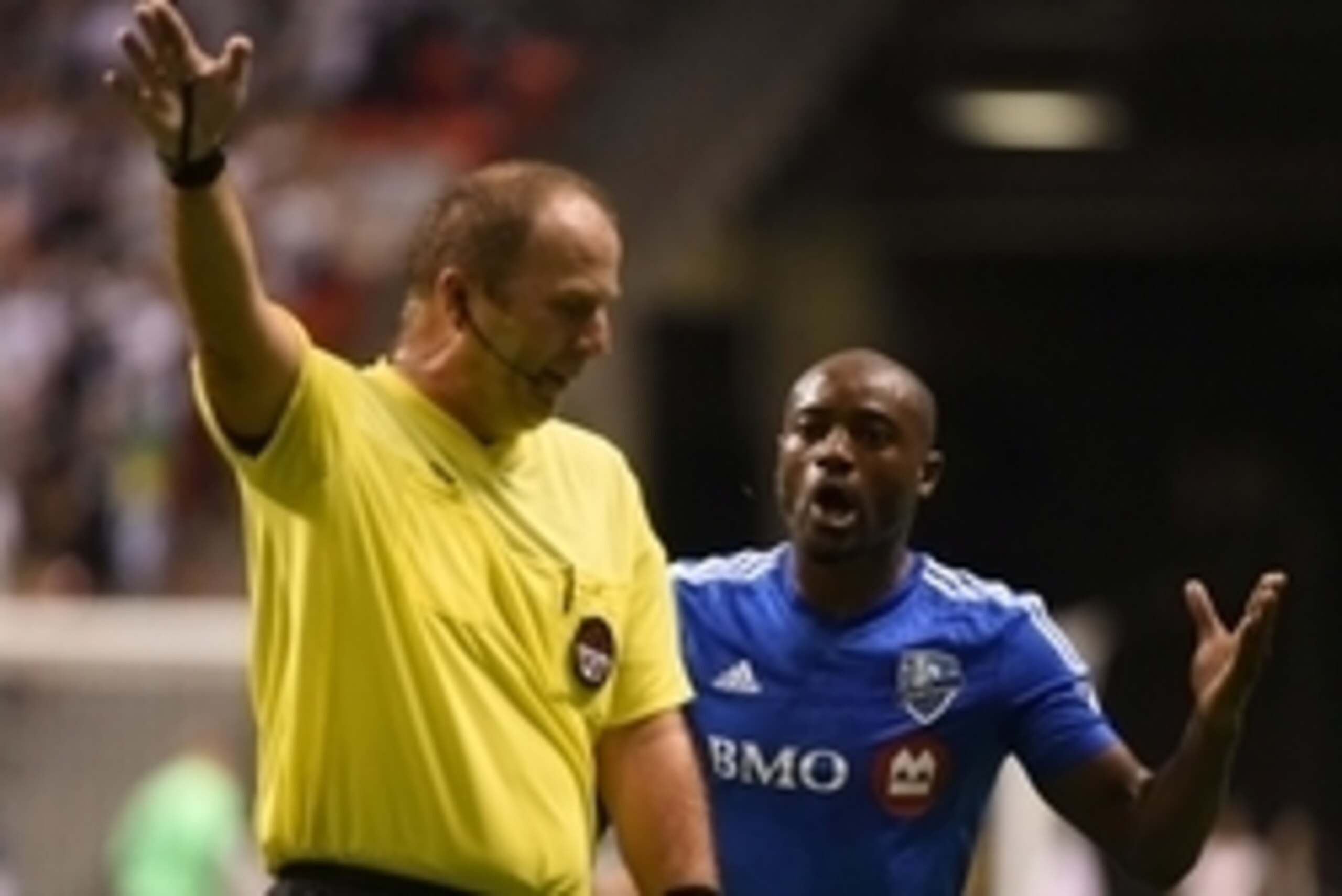 Aug 26, 2015; Vancouver, British Columbia, Canada; Montreal Impact midfielder Nigel Reo-Coker (14) reacts to a call during the second half against the Vancouver Whitecaps at BC Place. The Vancouver Whitecaps won 2-0. Mandatory Credit: Anne-Marie Sorvin-US