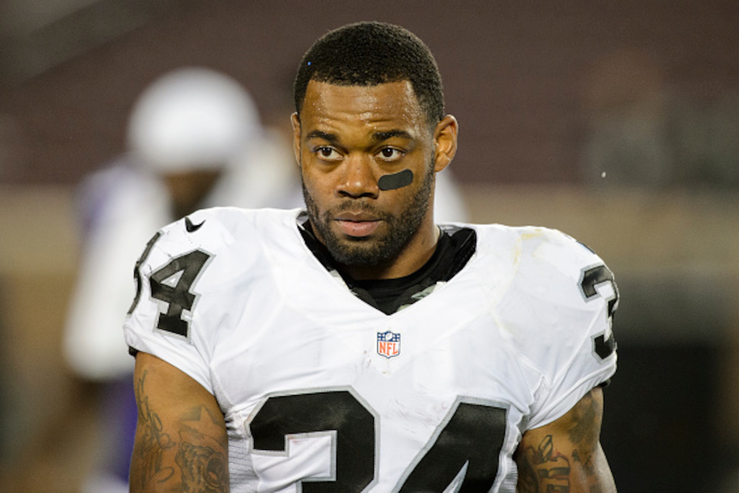 MINNEAPOLIS, MN - AUGUST 22: George Atkinson #34 of the Oakland Raiders looks on during the preseason game against the Minnesota Vikings on August 22, 2014 at TCF Bank Stadium in Minneapolis, Minnesota. The Vikings defeated the Raiders 20-12. (Photo by Ha