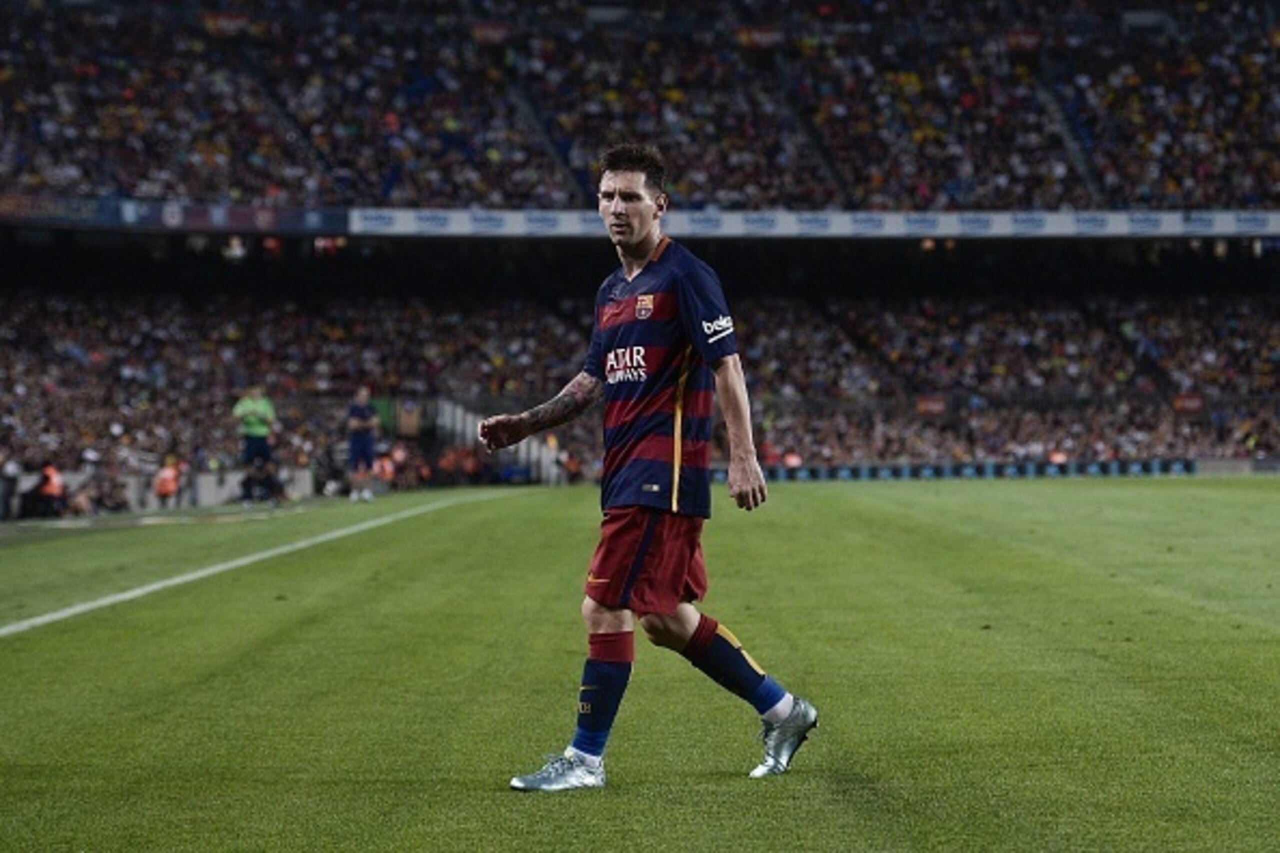 Barcelona's Argentinian forward Lionel Messi looks on as he walks on the pitch during the Spanish league football match FC Barcelona vs Malaga CF at the Camp Nou stadium in Barcelona on August 29, 2015.   AFP PHOTO/ JOSEP LAGO        (Photo credit should 