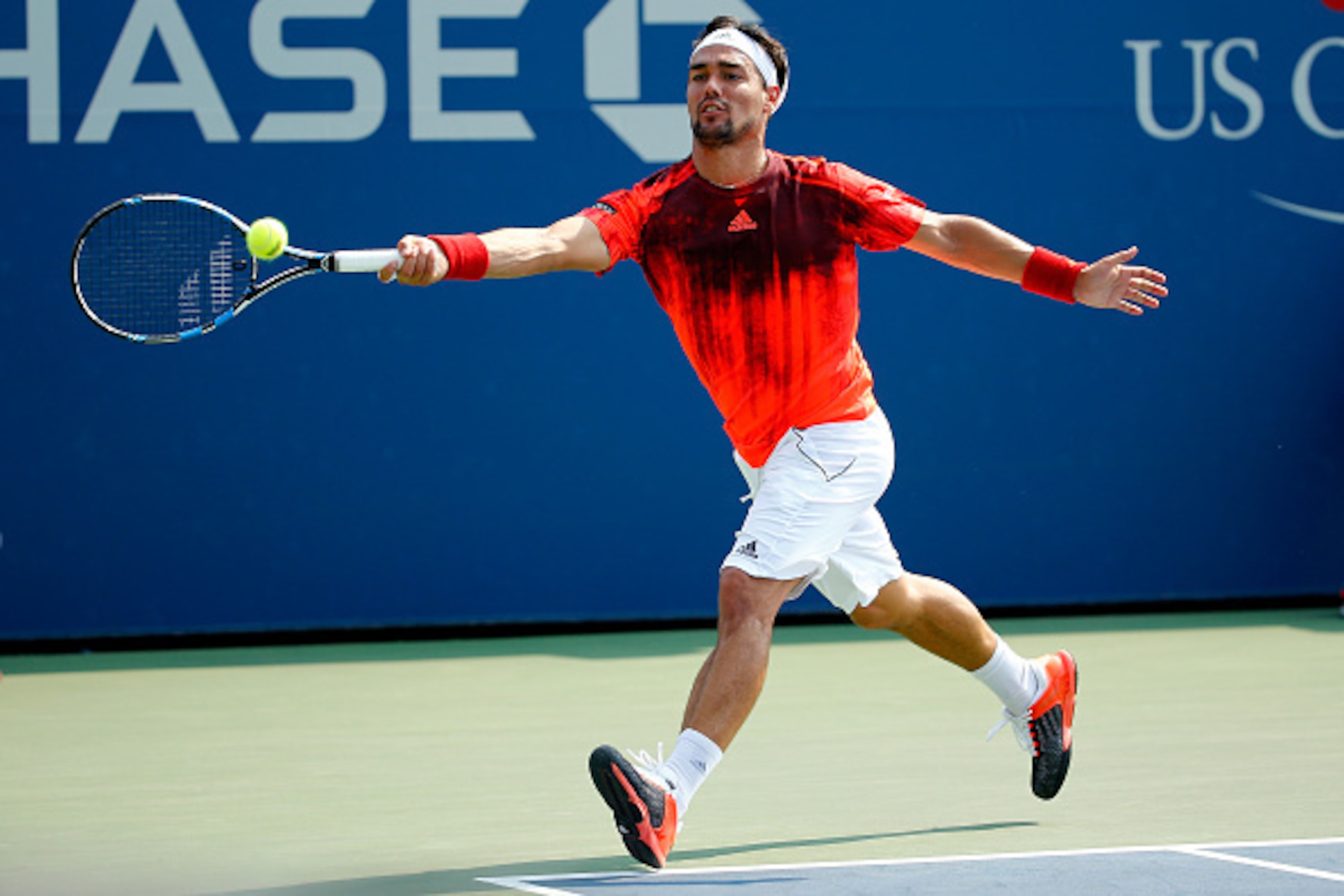NEW YORK, NY - SEPTEMBER 02:  Fabio Fognini of Italy returns a shot against Pablo Cuevas of Uruguay during their Men's Singles Second Round match on Day Three of the 2015 US Open at the USTA Billie Jean King National Tennis Center on September 2, 2015 in 