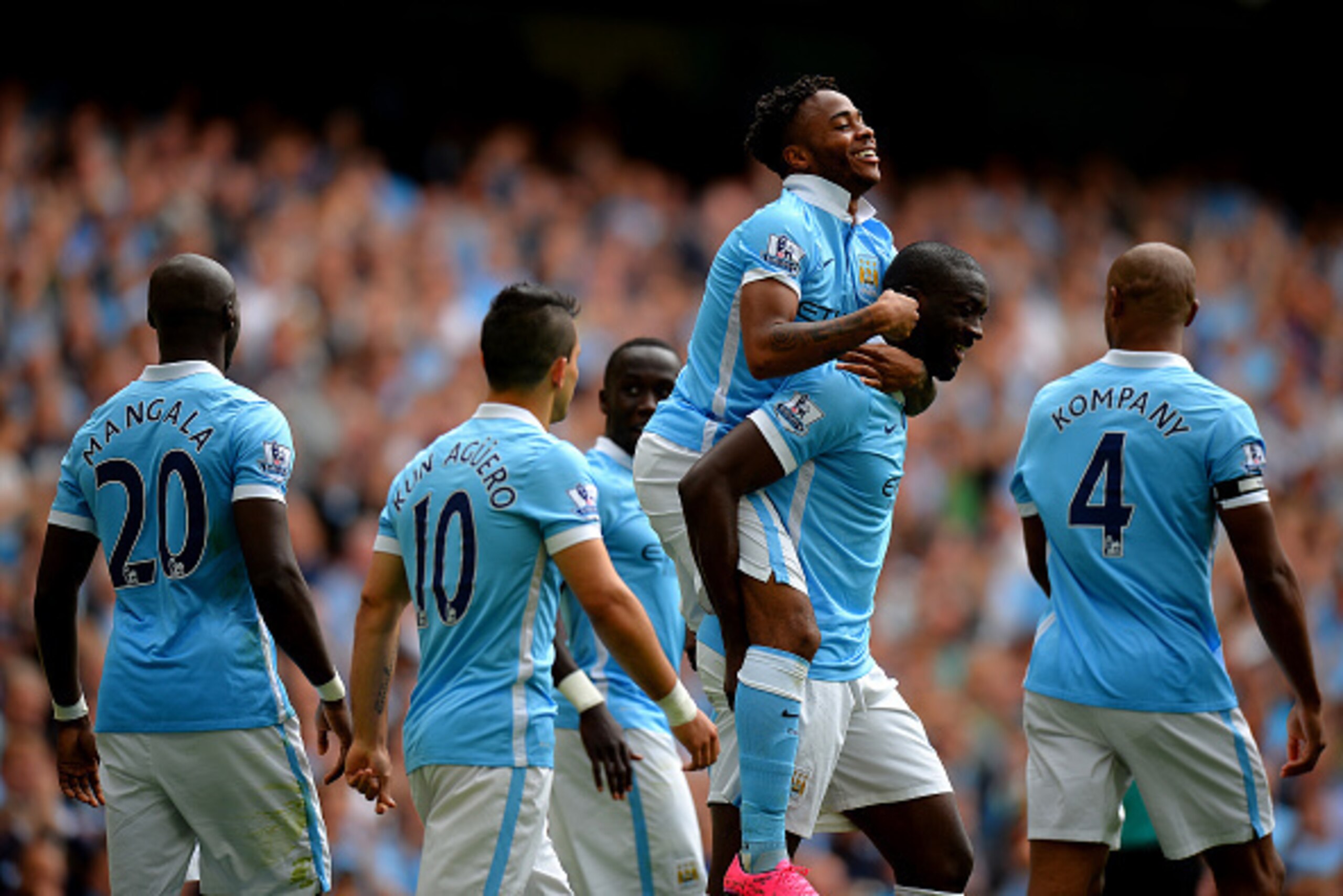 MANCHESTER, ENGLAND - AUGUST 29: Raheem Sterling (3rd R) of Manchester City celebrates scoring his team's first goal with his team mates during the Barclays Premier League match between Manchester City and Watford at Etihad Stadium on August 29, 2015 in M
