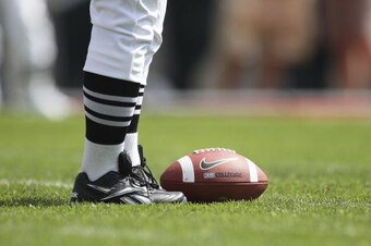 EAST LANSING, MI - SEPTEMBER 05: The referee marks the ball for play during the game between Montana State Bobcats and the Michigan State Spartans on September 5, 2009 at Spartan Stadium in East Lansing, Michigan. Michigan State won the game 44-3. (Photo 