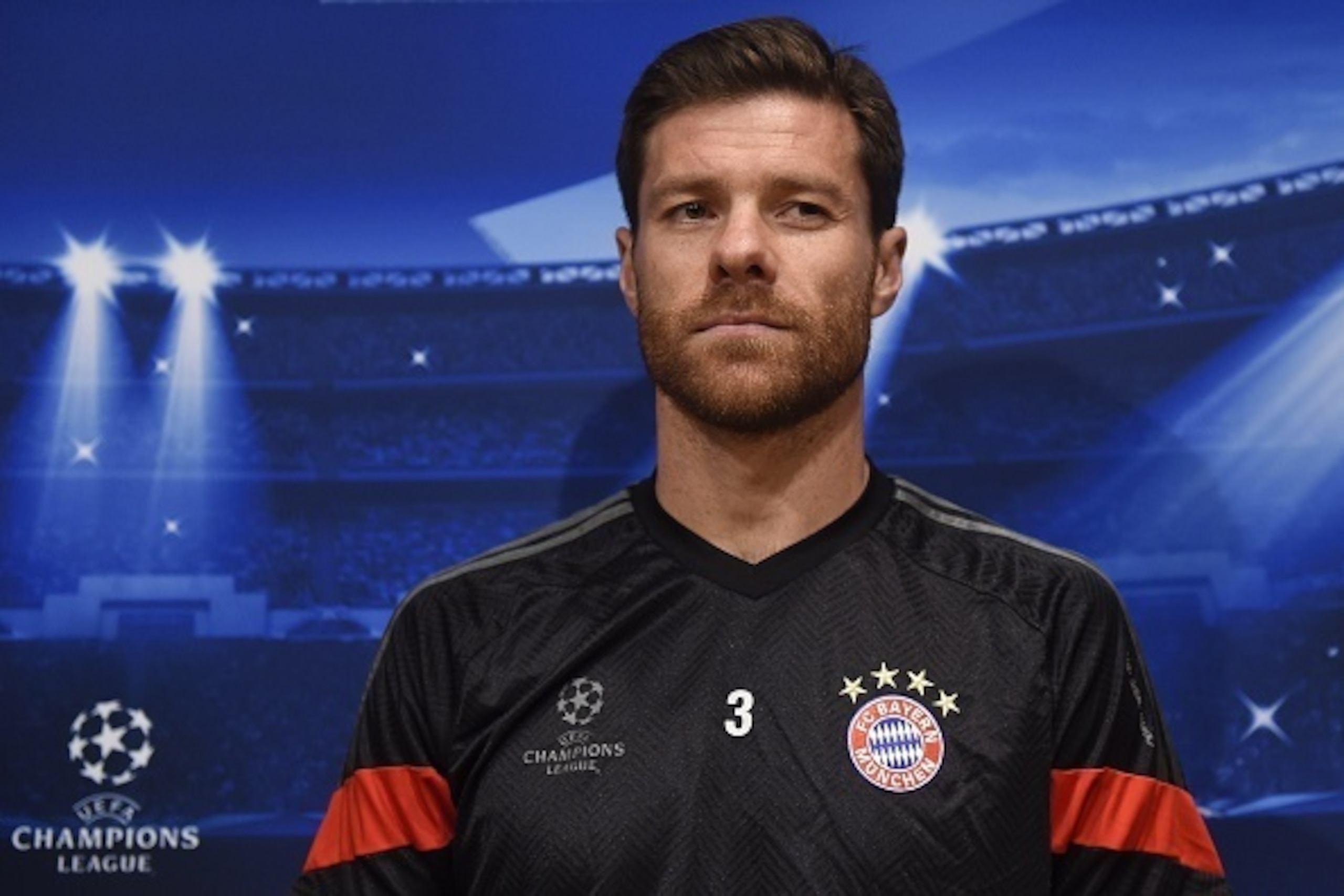 Bayern Munich's Spanish defender Xabi Alonso poses prior to a press conference at the camp nou stadium on May 5, 2015, on the eve of the UEFA Champions League semi-final first leg football match between FC Barcelona and FC Bayern Munich.   AFP PHOTO/ JOSE