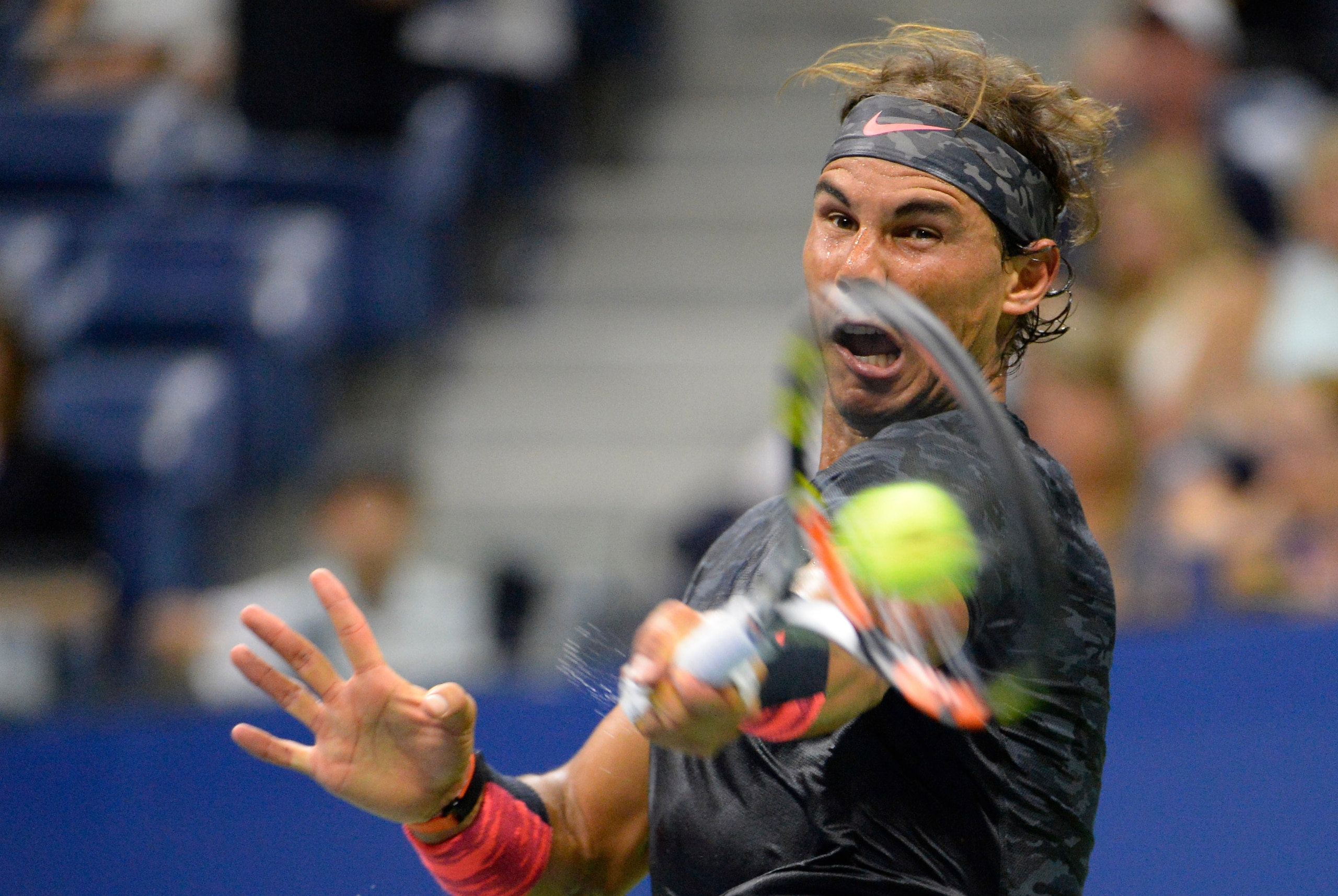 Aug 31, 2015; New York, NY, USA;  Rafael Nadal of Spain hits to Borna Coric of Croatia on day one of the 2015 US Open tennis tournament at USTA Billie Jean King National Tennis Center. Mandatory Credit: Robert Deutsch-USA TODAY Sports