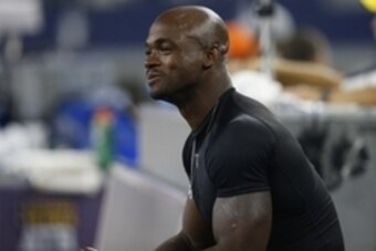 Aug 29, 2015; Arlington, TX, USA; Minnesota Vikings running back Adrian Peterson (28) on the sidelines during the game against the Dallas Cowboys at AT&T Stadium. Mandatory Credit: Matthew Emmons-USA TODAY Sports