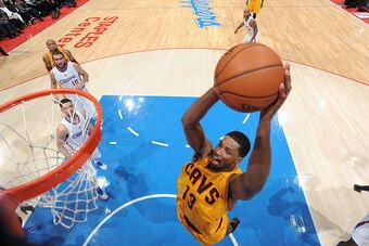 LOS ANGELES, CA -  JANUARY 16: Tristan Thompson #13 of the Cleveland Cavaliers goes up for a dunk against the Los Angeles Clippers during the game on January 16, 2015 at STAPLES Center in Los Angeles, California. NOTE TO USER: User expressly acknowledges 