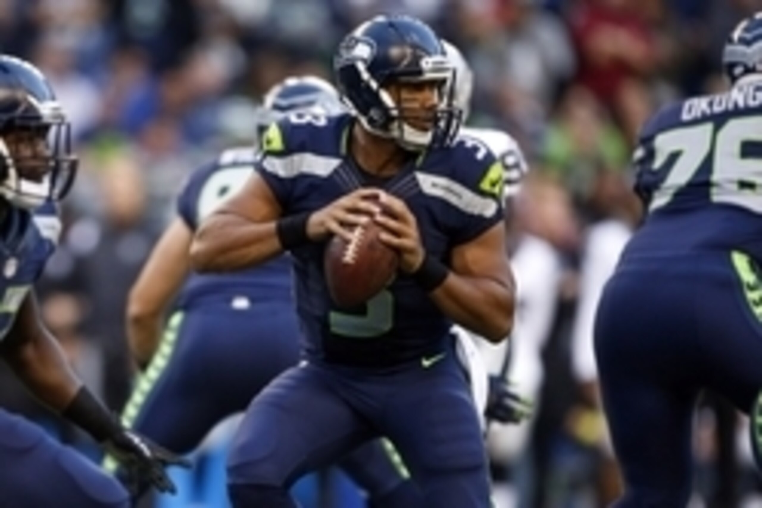 Sep 3, 2015; Seattle, WA, USA; Seattle Seahawks quarterback Russell Wilson (3) drops back to pass against the Oakland Raiders during the first quarter at CenturyLink Field. Mandatory Credit: Joe Nicholson-USA TODAY Sports