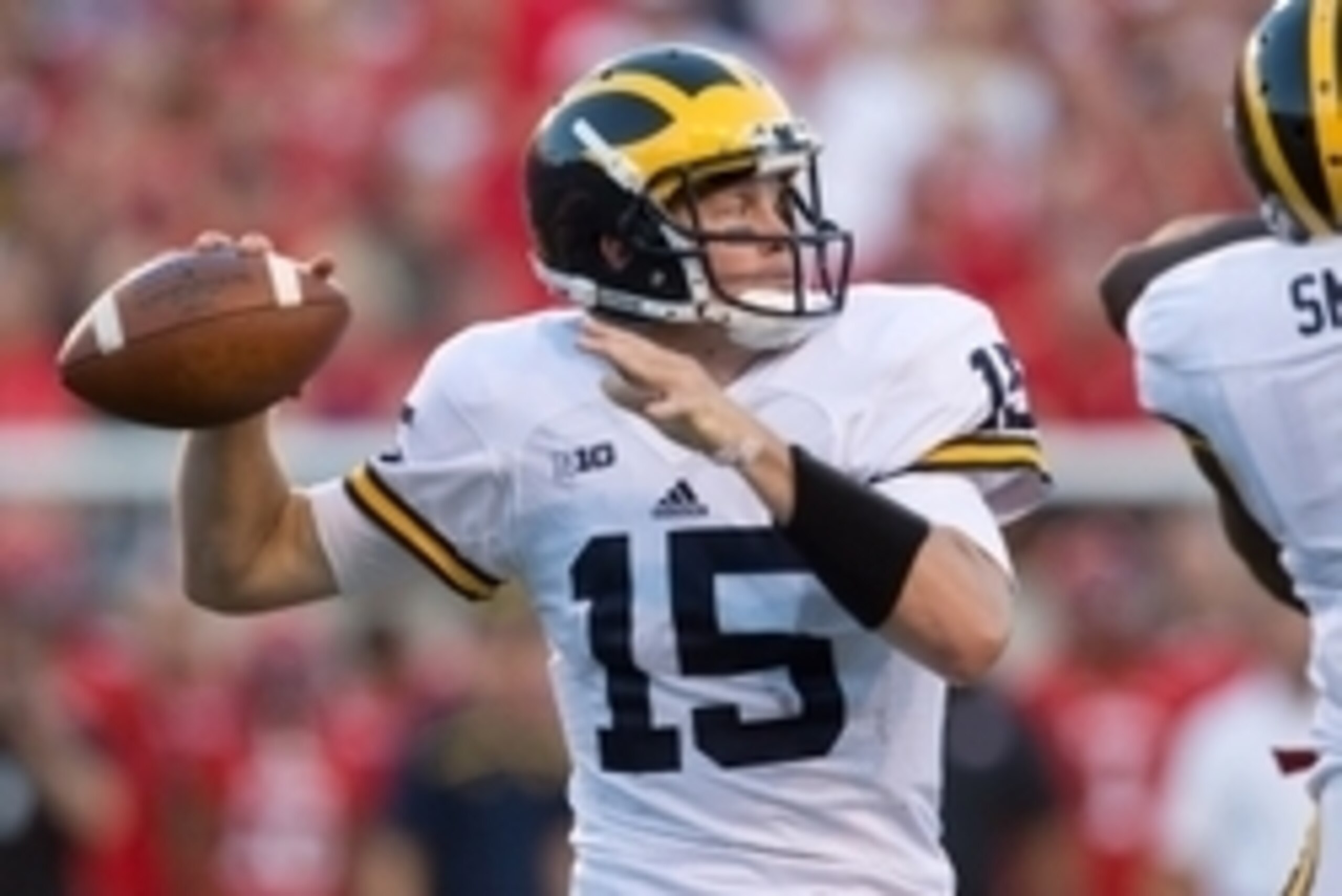 Sep 3, 2015; Salt Lake City, UT, USA; Michigan Wolverines quarterback Jake Rudock (15) drops back to pass during the first half against the Utah Utes at Rice-Eccles Stadium. Mandatory Credit: Russ Isabella-USA TODAY Sports
