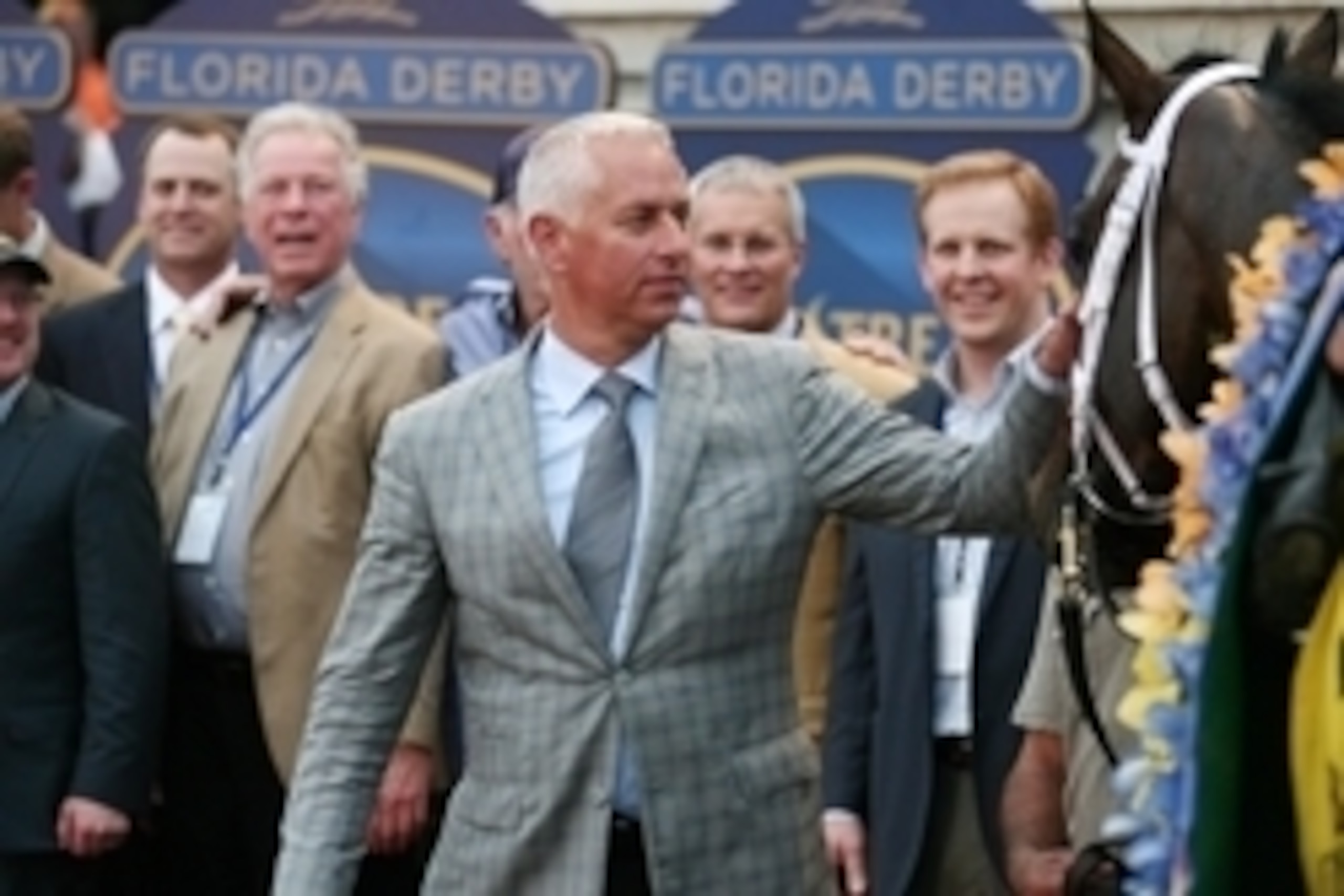Mar 29, 2014; Hallandale Beach, FL, USA; Equestrian trainer Todd Pletcher pats Constitution after winning the Florida Derby at Gulfstream Park. Mandatory Credit: Mark Zerof-USA TODAY Sports