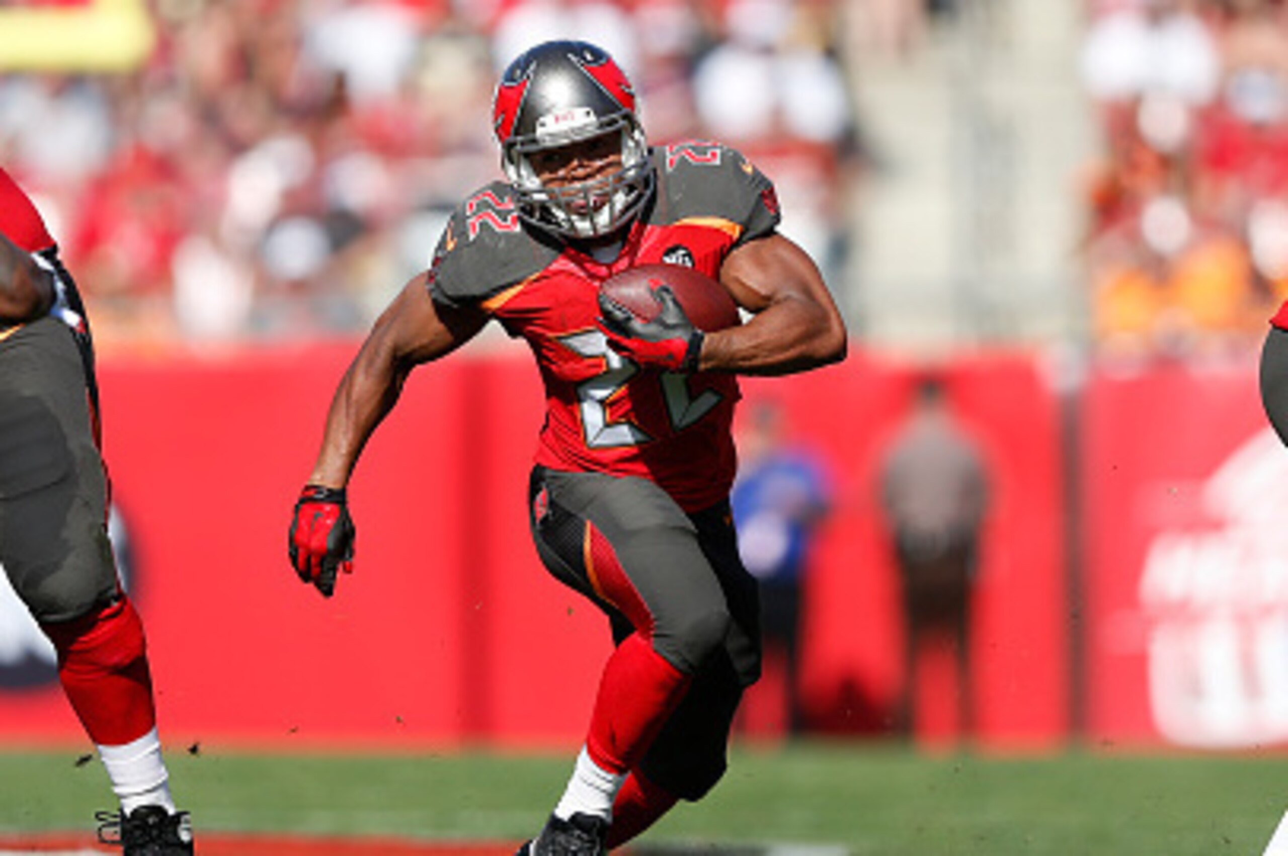 TAMPA, FL - DECEMBER 28: Doug Martin #22 of the Tampa Bay Buccaneers runs with the ball against the New Orleans Saints during the game at Raymond James Stadium on December 28, 2014 in Tampa, Florida. The Saints defeated the Bucs 23-20. (Photo by Joe Robbi TAMPA, FL - DECEMBER 28: Doug Martin #22 of the Tampa Bay Buccaneers runs with the ball against the New Orleans Saints during the game at Raymond James Stadium on December 28, 2014 in Tampa, Florida. The Saints defeated the Bucs 23-20. (Photo by Joe Robbi