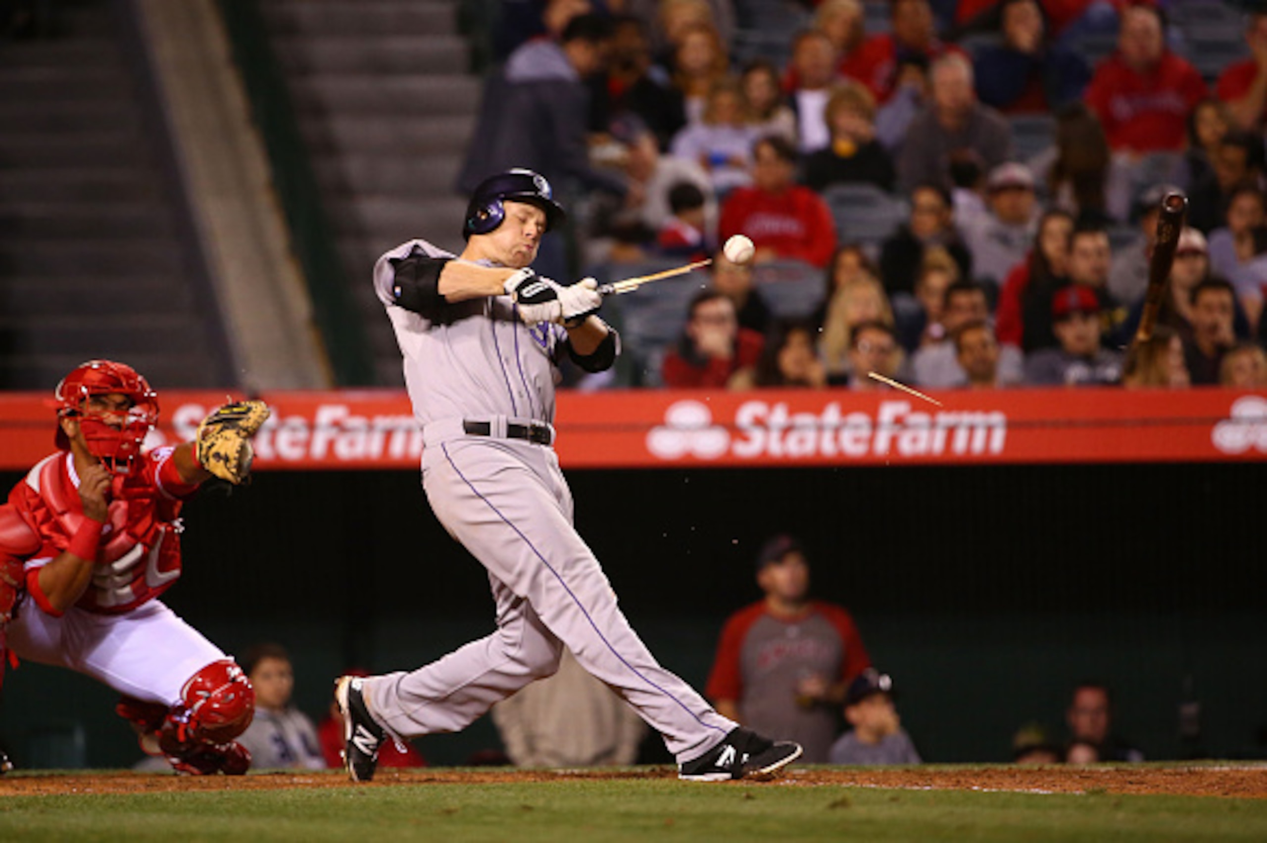 ANAHEIM, CA - MAY 12:  Justin Morneau #33 of the Colorado Rockies breaks his bat during his at-bat in the sixth inning during the MLB game against the Los Angeles Angels of Anaheim at Angel Stadium of Anaheim on May 12, 2015 in Anaheim, California.  (Phot