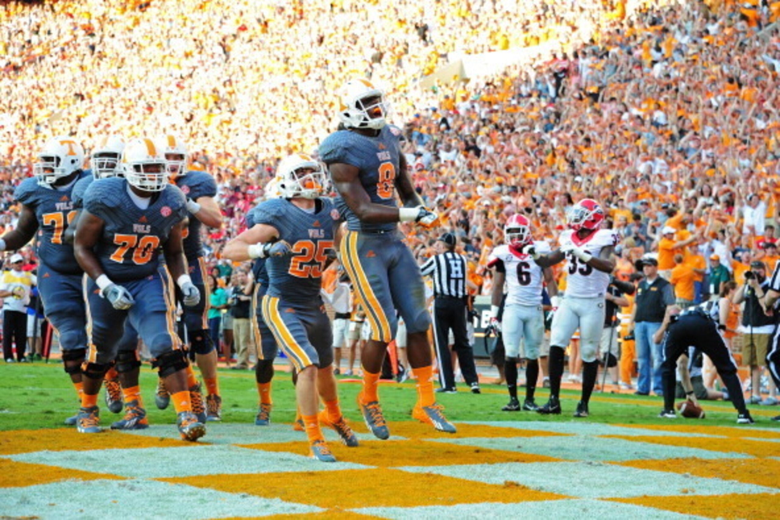 KNOXVILLE, TN - OCTOBER 5:  Marquez North #8 of the Tennessee Volunteers celebrates after scoring a touchdown against the Georgia Bulldogs at Neyland Stadium on October 5, 2013 in Knoxville, Tennessee.  (Photo by Scott Cunningham/Getty Images)