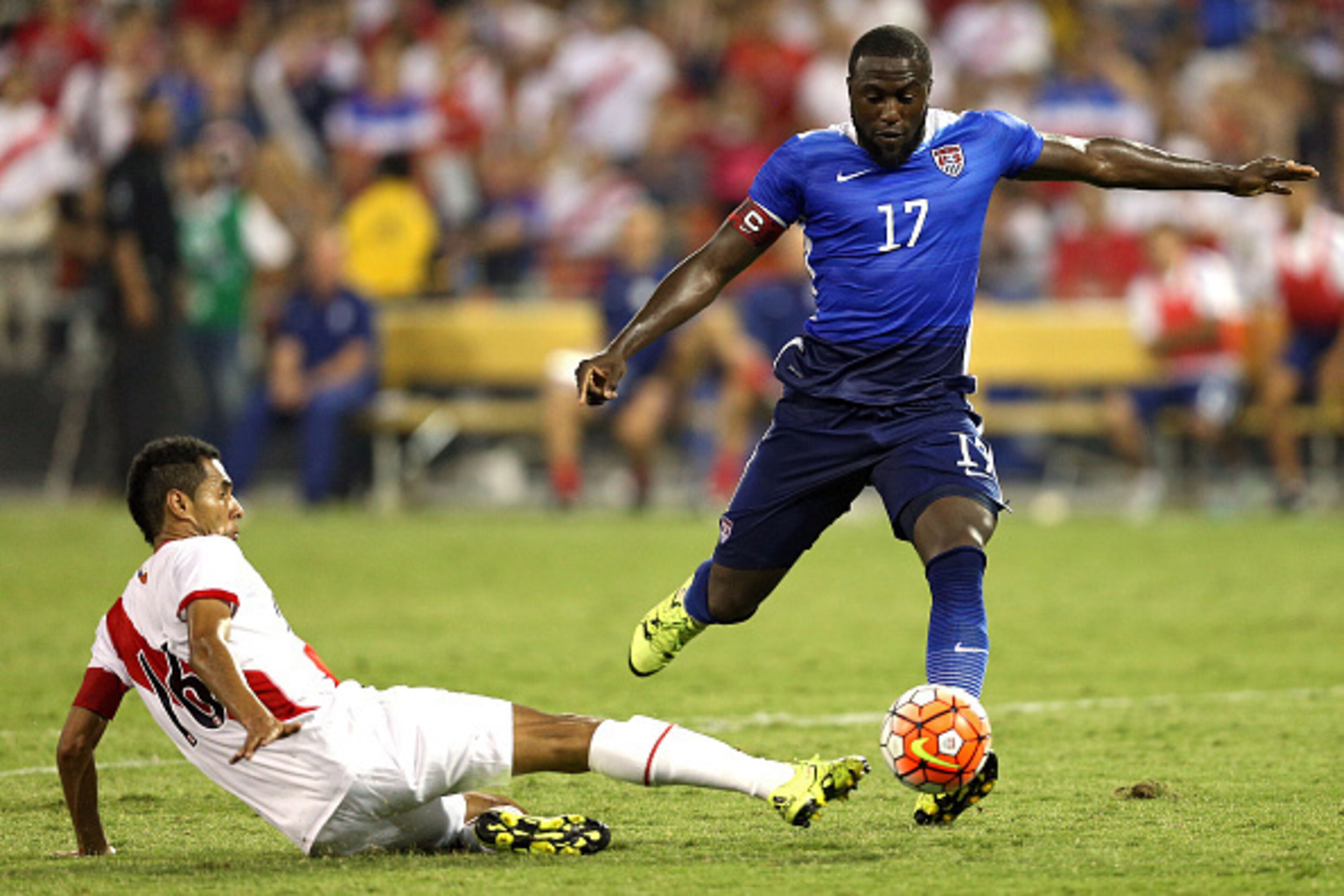 WASHINGTON, DC - SEPTEMBER 04: Jozy Altidore #17 of the United States shoots in front of Carlos Lobaton #16 of Peru in the second half during an international friendly at RFK Stadium on September 4, 2015 in Washington, DC. (Photo by Patrick Smith/Getty Im