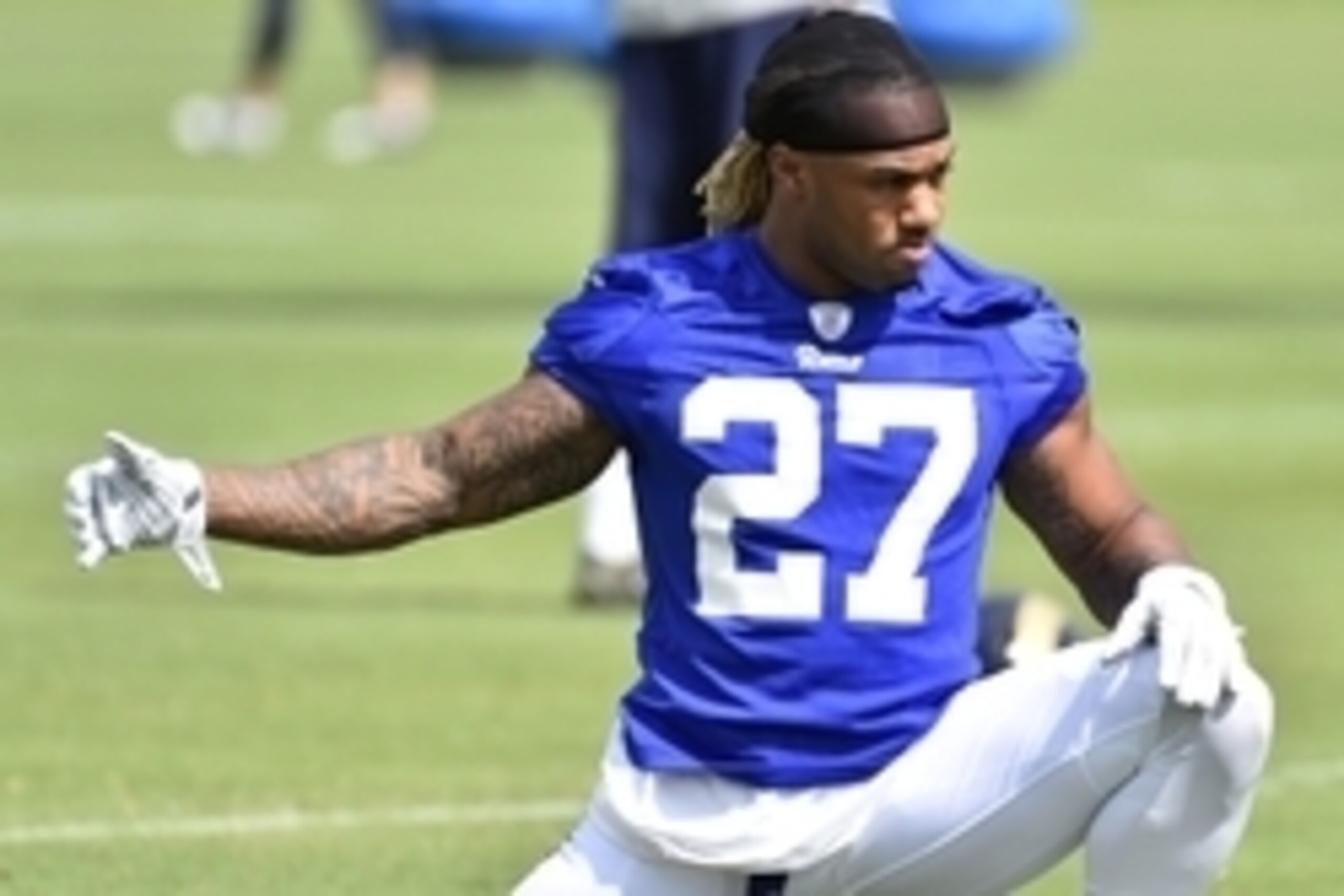 Aug 1, 2015; Earth City, MO, USA; St. Louis Rams running back Tre Mason (27) stretches at Rams Park. Mandatory Credit: Jasen Vinlove-USA TODAY Sports Aug 1, 2015; Earth City, MO, USA; St. Louis Rams running back Tre Mason (27) stretches at Rams Park. Mandatory Credit: Jasen Vinlove-USA TODAY Sports