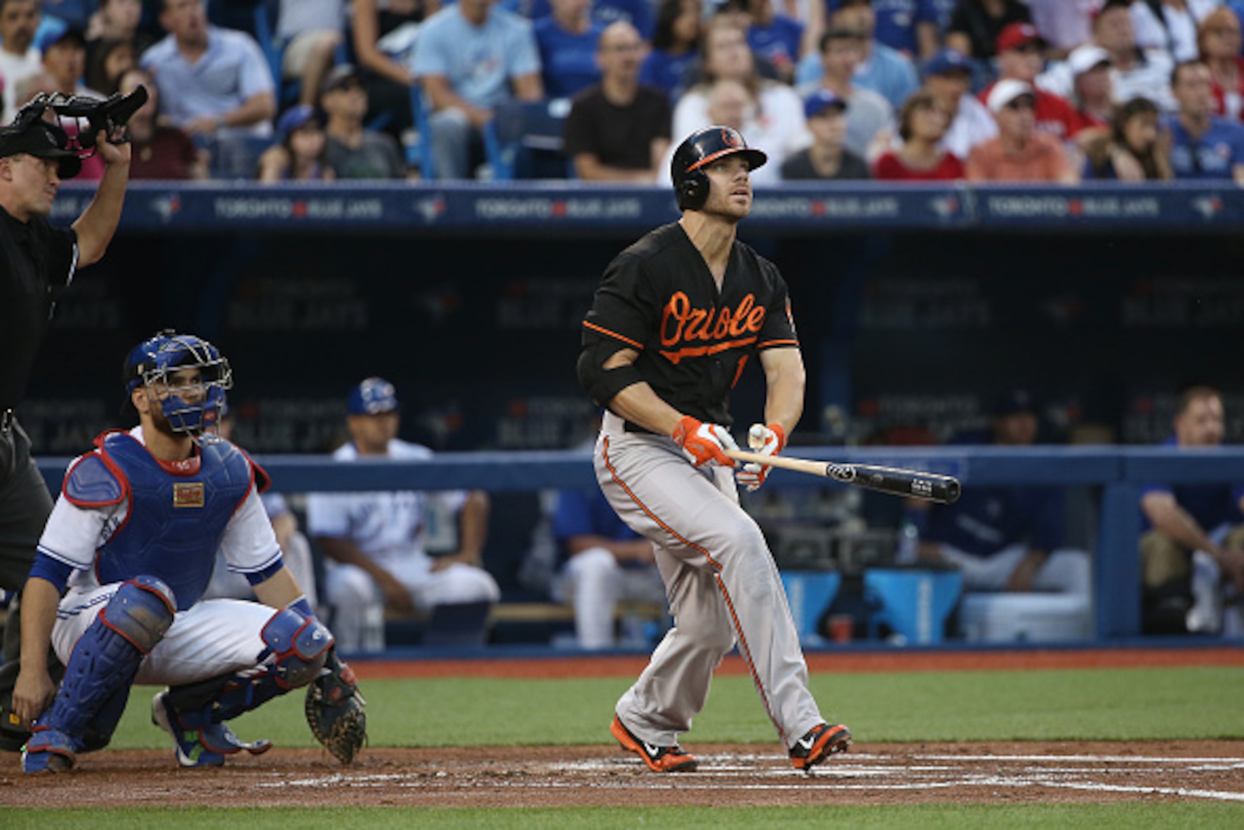 TORONTO, CANADA - SEPTEMBER 4: Chris Davis #19 of the Baltimore Orioles hits a solo home run in the second inning during MLB game action against the Toronto Blue Jays on September 4, 2015 at Rogers Centre in Toronto, Ontario, Canada. (Photo by Tom Szczerb