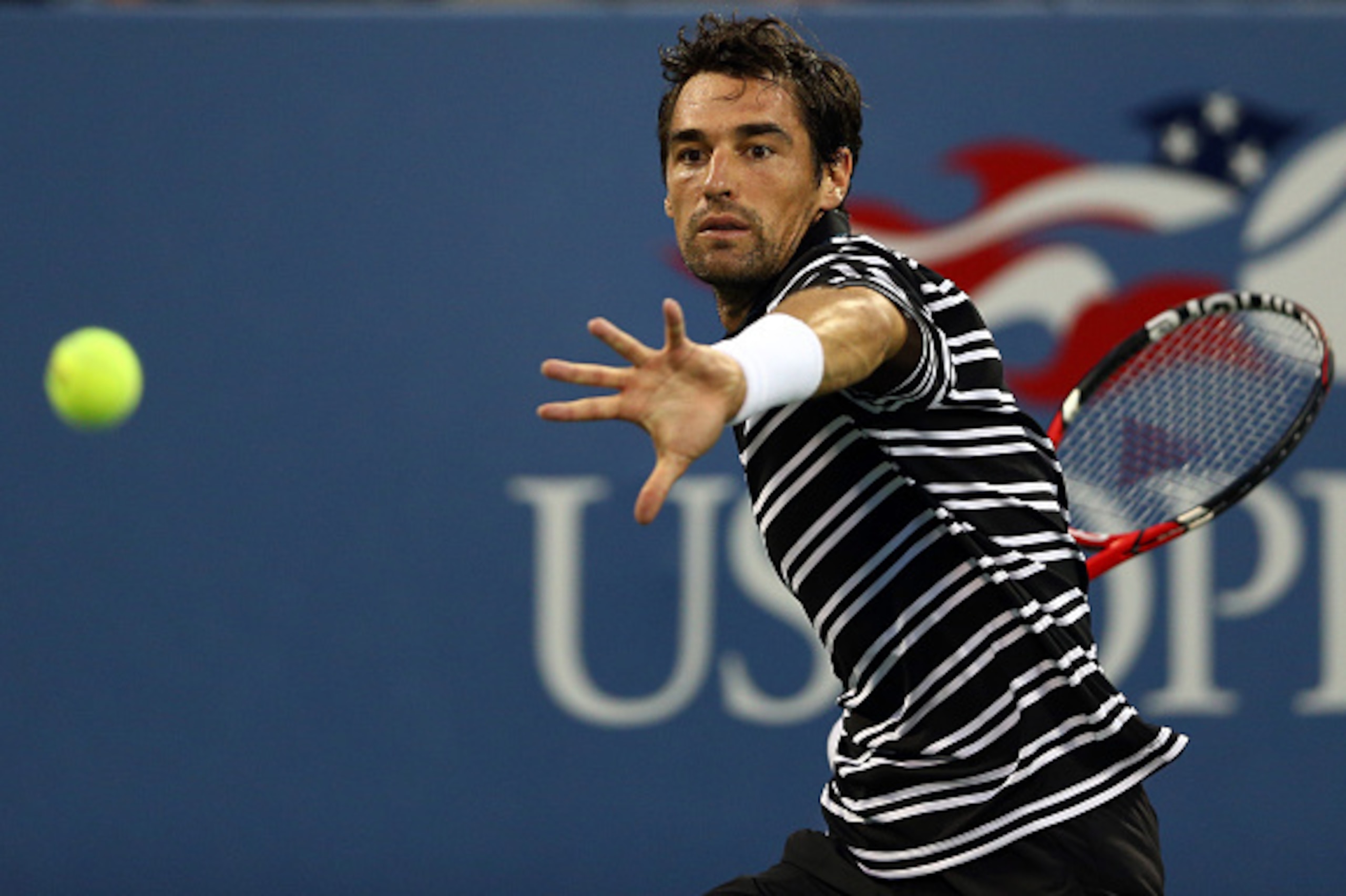 NEW YORK, NY - SEPTEMBER 04:  Jeremy Chardy of France returns a shot against David Ferrer of Spain during their Men's Singles Third Round match on Day Five of the 2015 US Open at the USTA Billie Jean King National Tennis Center on September 4, 2015 in the